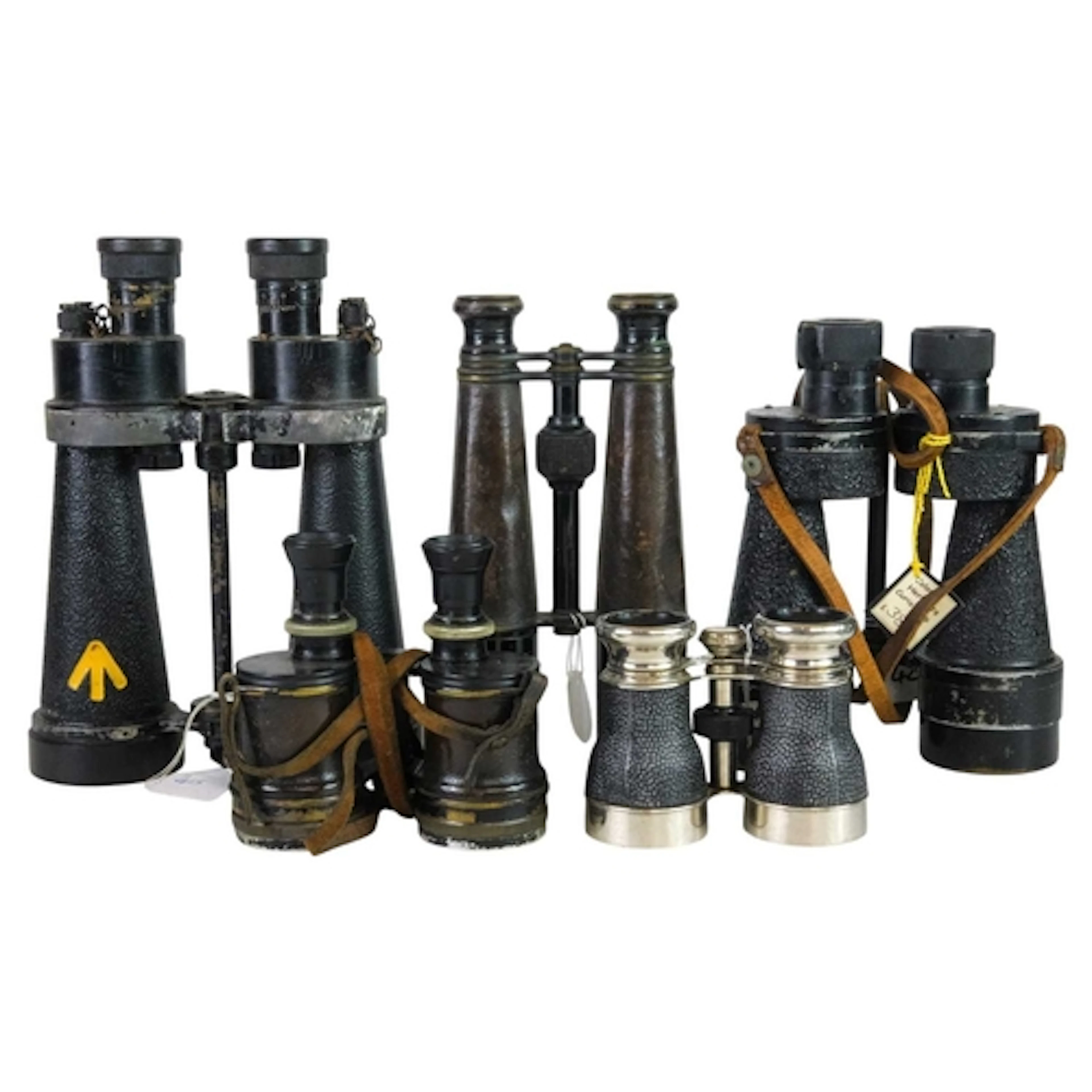 A collection of binoculars. A pair of French field binocular...