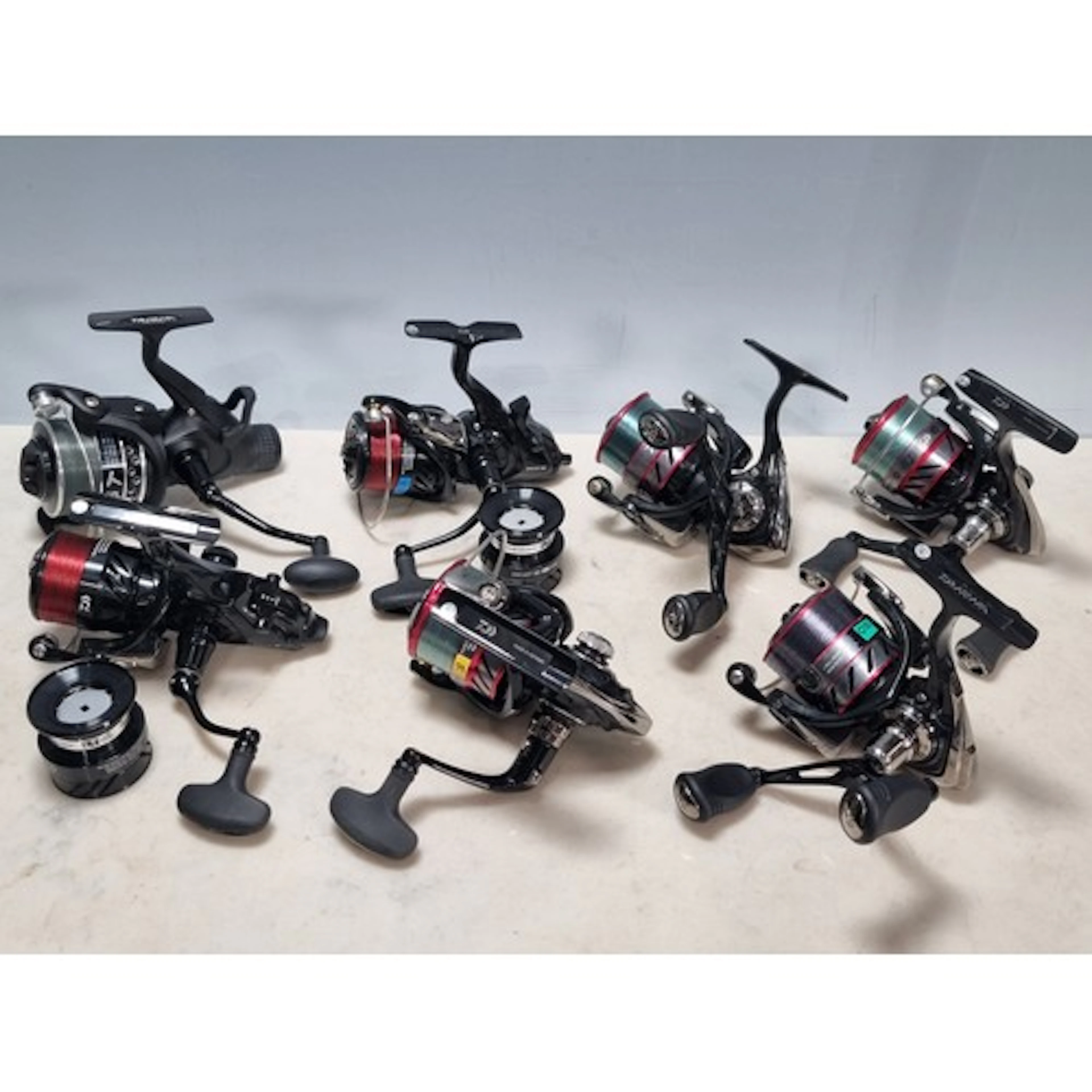 Three Daiwa Ninja 2508DA match Fishing Reels, two Daiwa Emca...