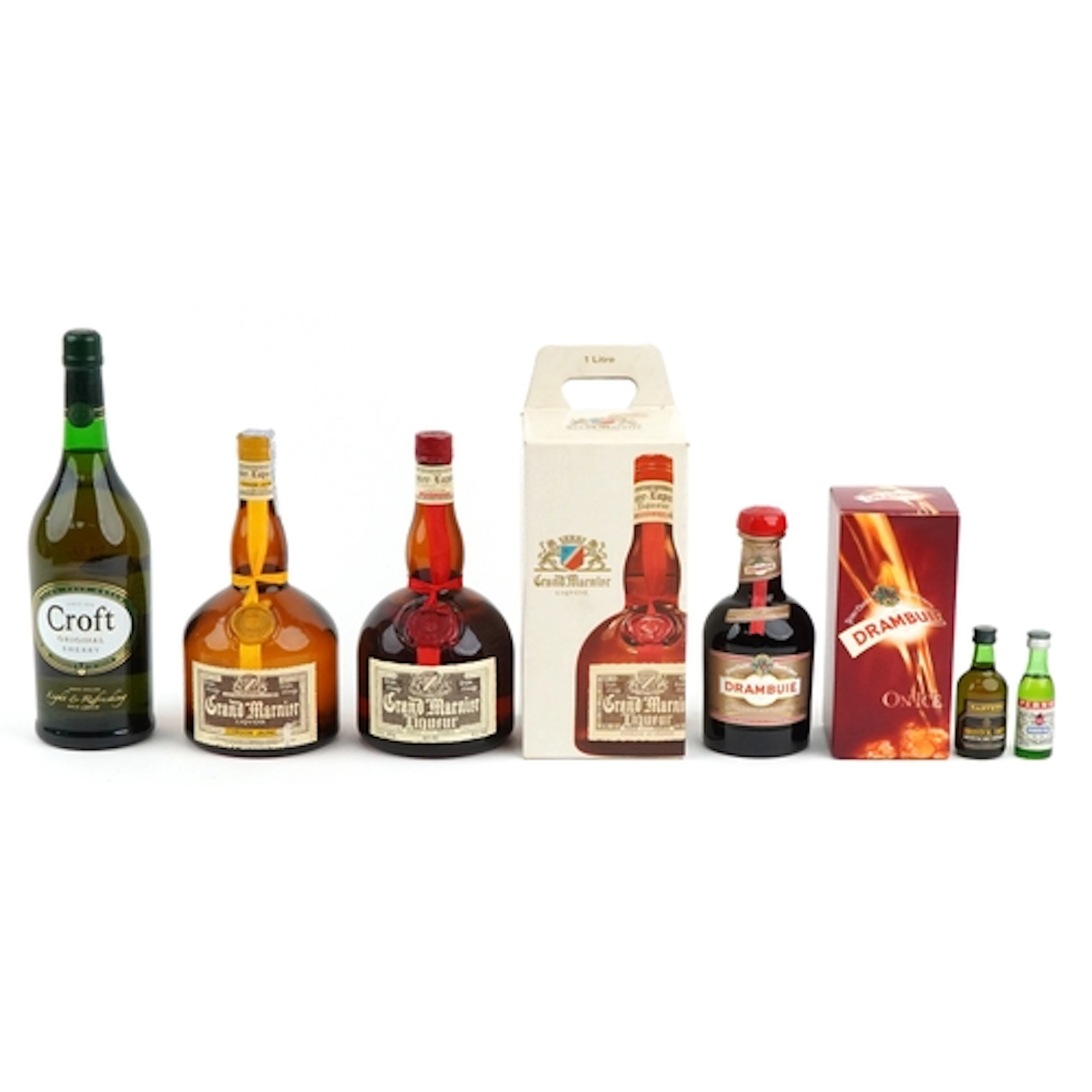 Two Grand Marnier liqueurs together with a Mandarin Napoleon...