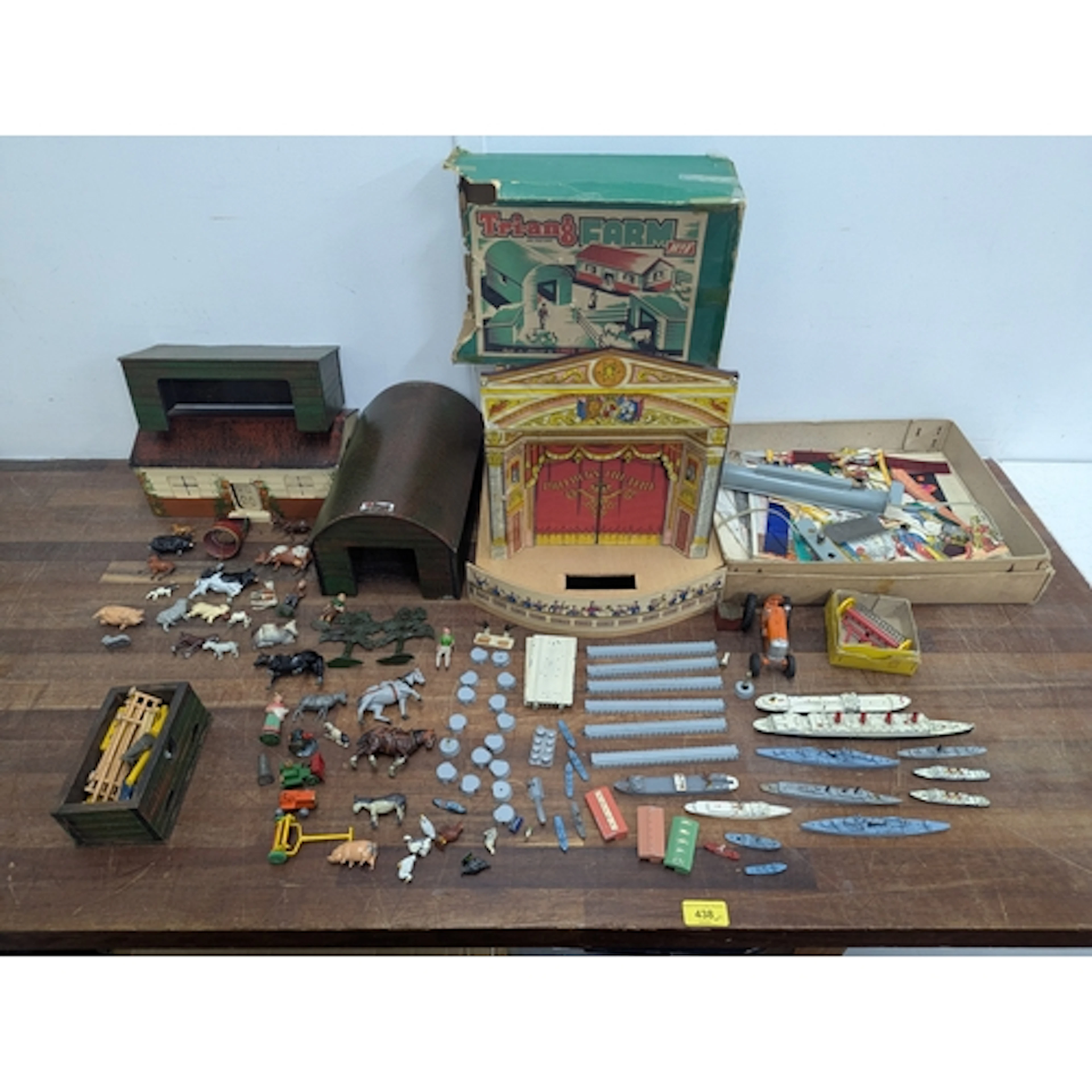 A mixed lot of toys to include Triang boats, a child's model...