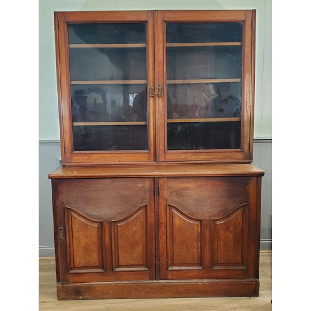 A mahogany Cupboard, the top with pair of glazed doors enclo...