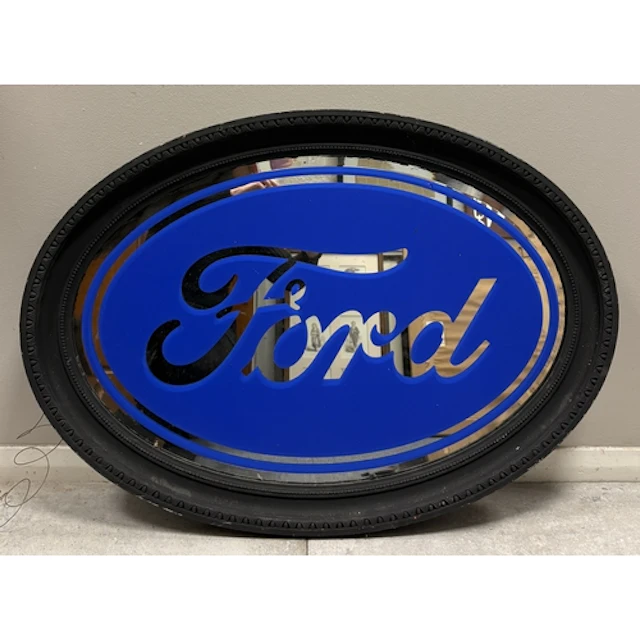 An oval vintage Ford Motor Company painted mirror. Approx. 8...