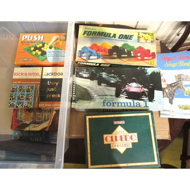 Box containing a quantity of various board games