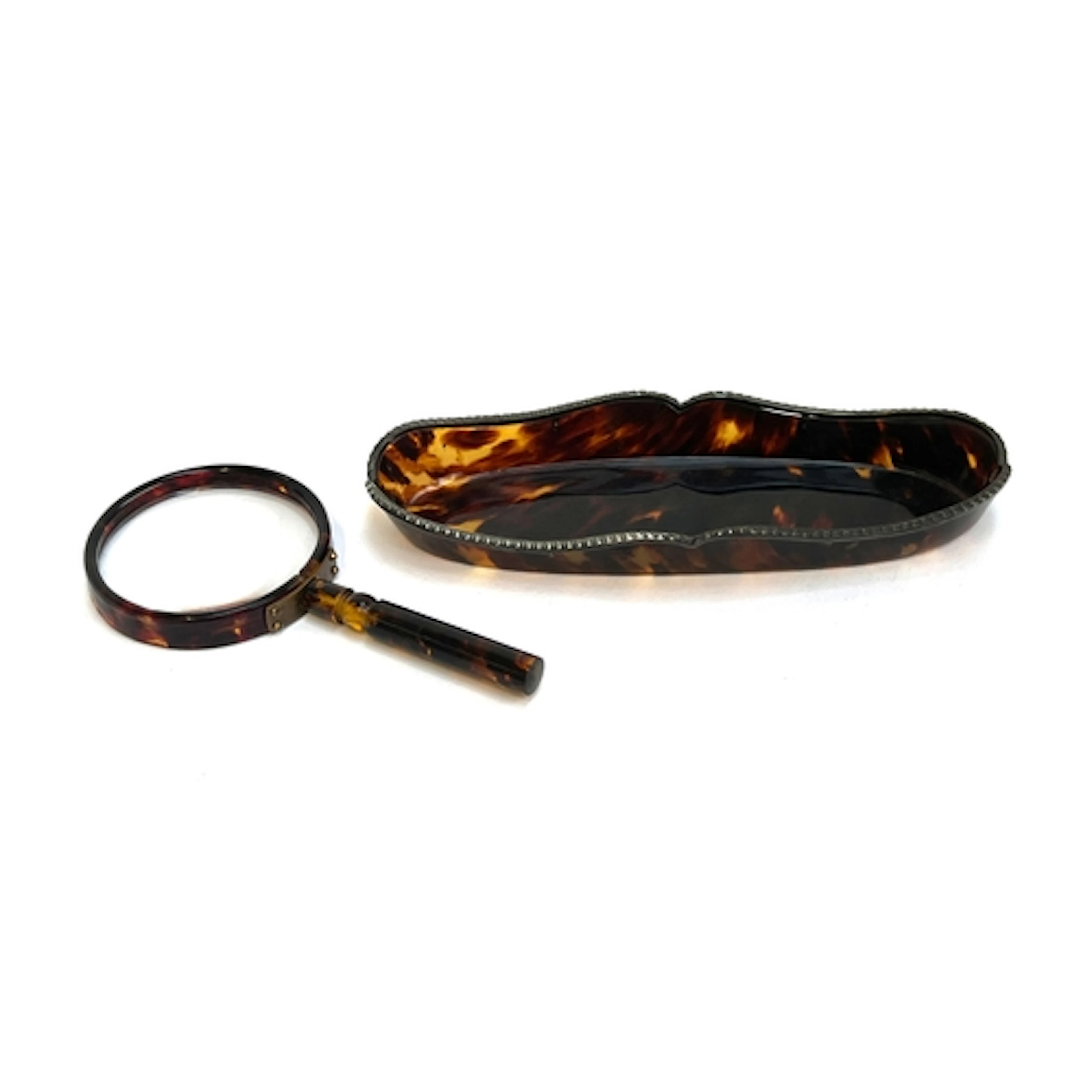 A tortoiseshell and silver mounted pin dish, 22cm wide, and ...