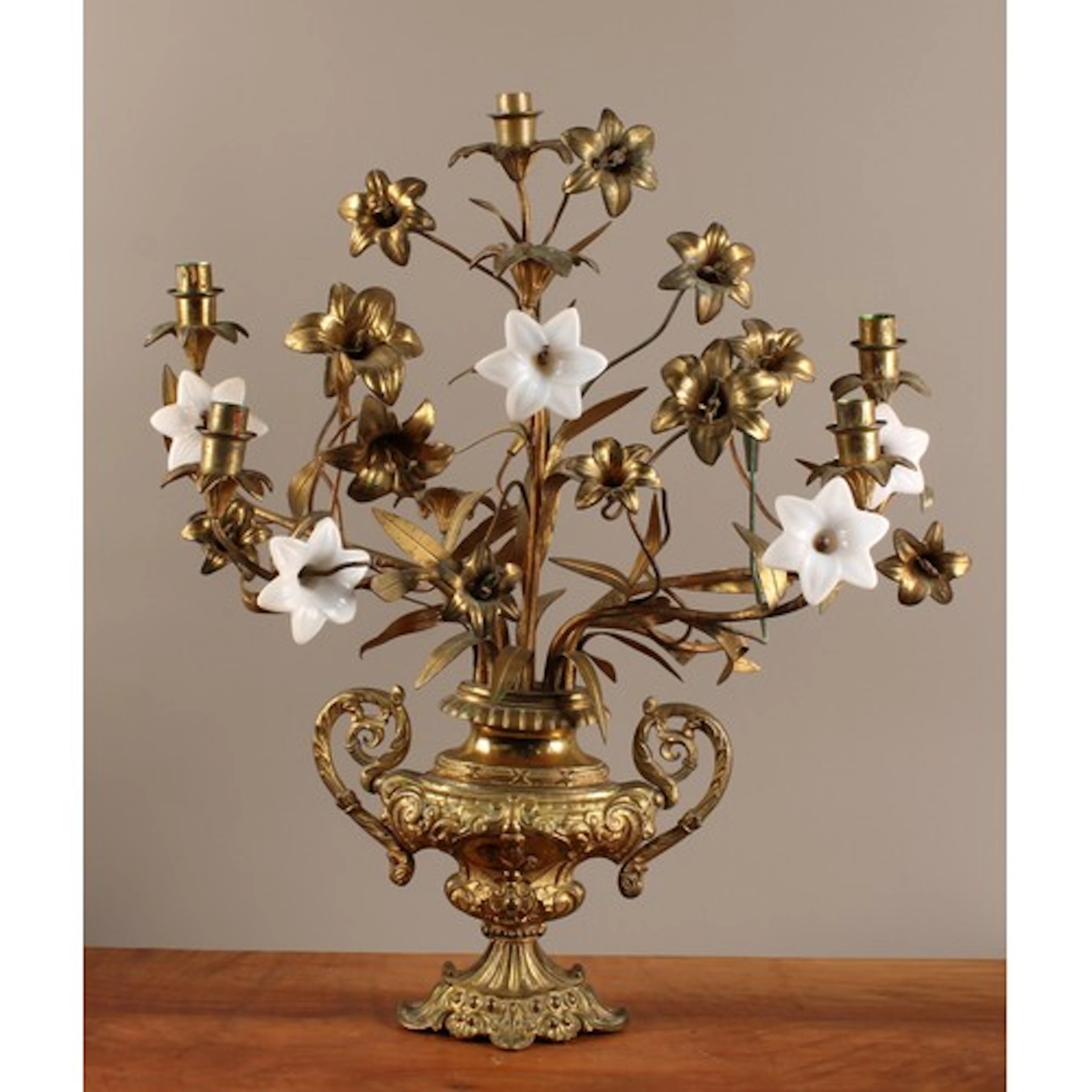 A 19th century gilt brass and opaque glass five-light candel...