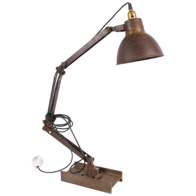 A Second World War British-made anglepoise type lamp, on bas...