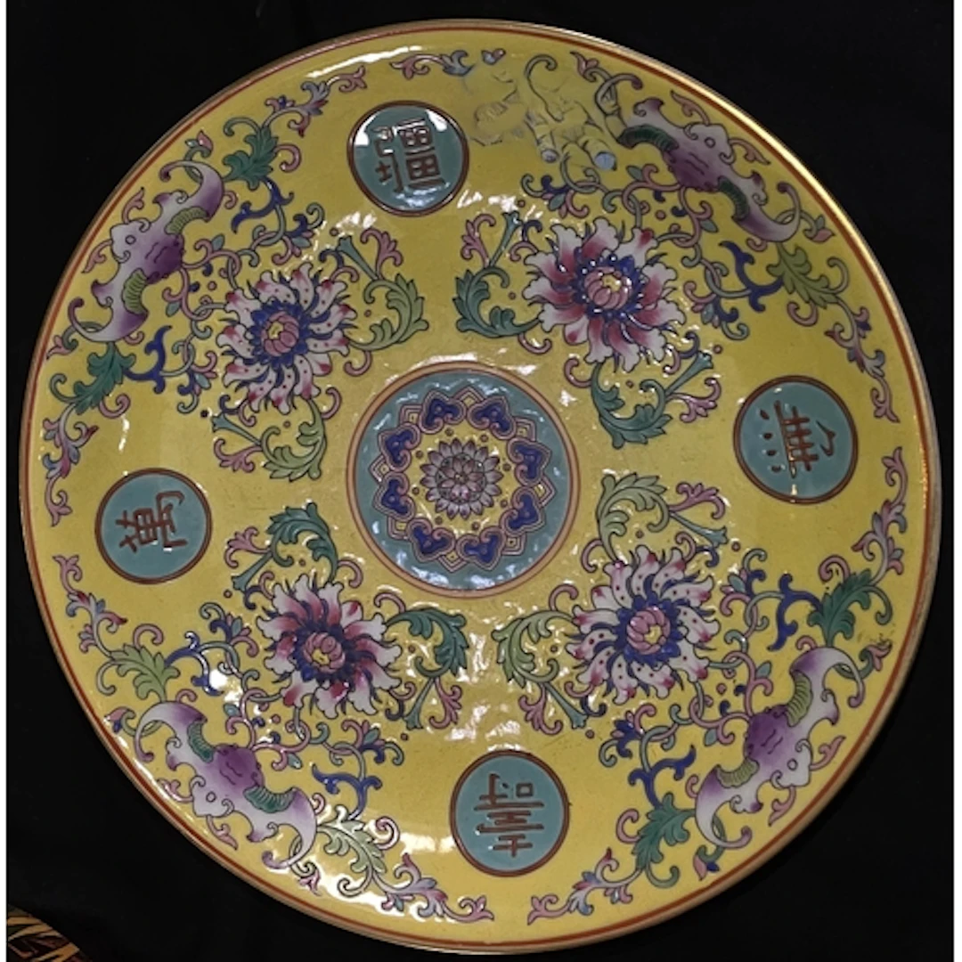 A Chinese Republic period, yellow ground dish with polychome...