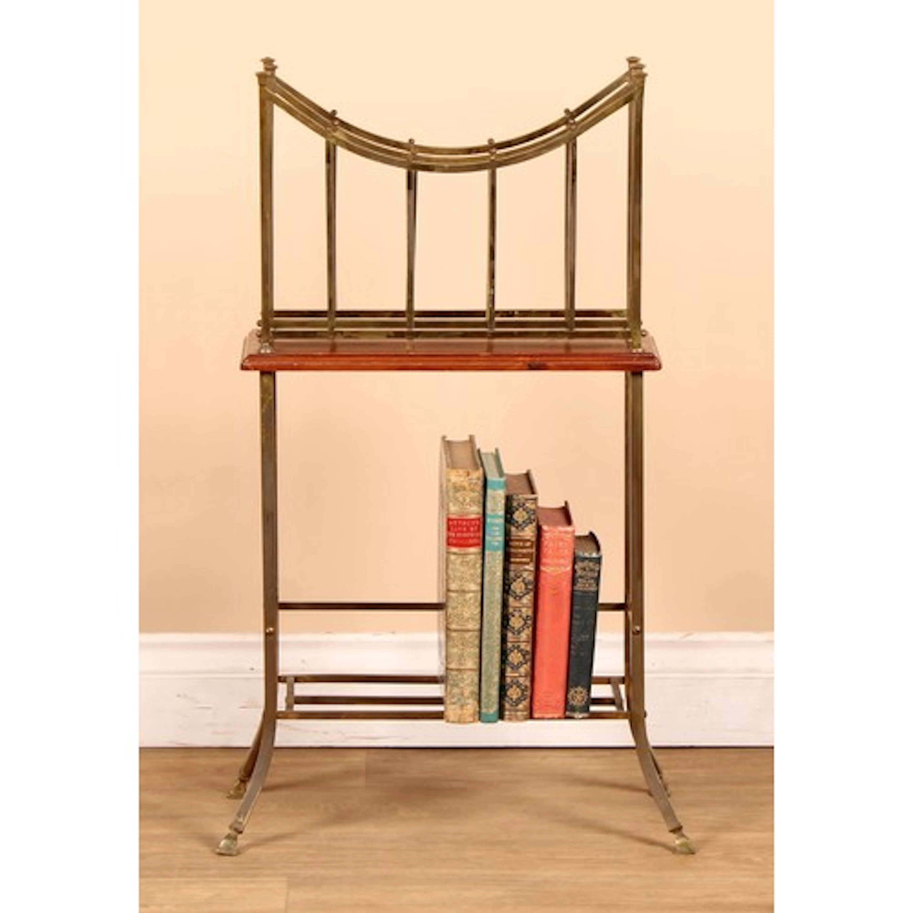 An Arts & Crafts period brass and mahogany newspaper Canterb...