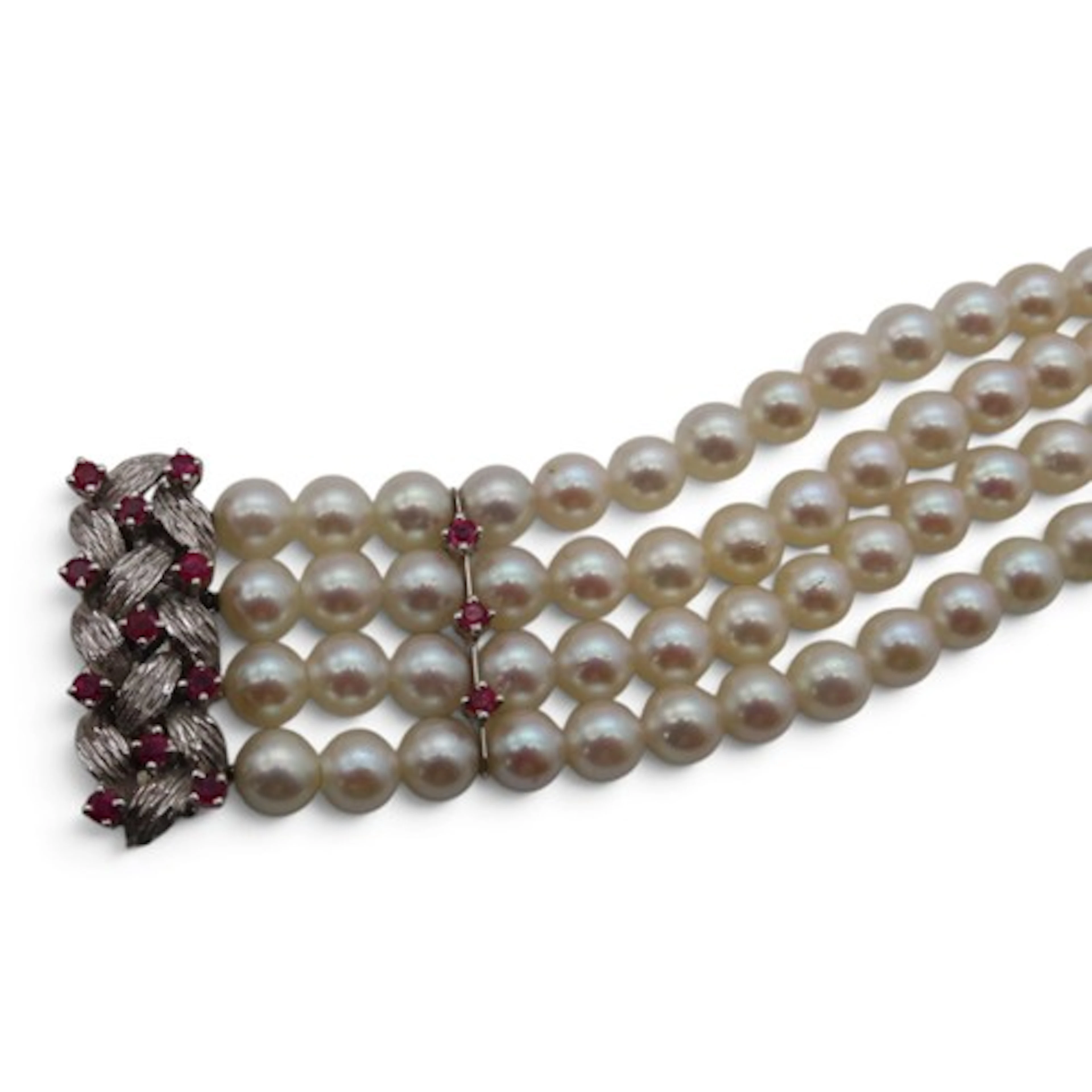 A four-strand cultured pearl bracelet, with 18ct white gold ...