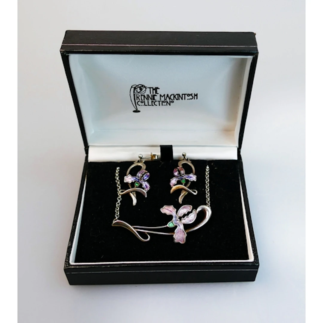 A Malcolm Gray silver and enamel iris decorated necklace wit...