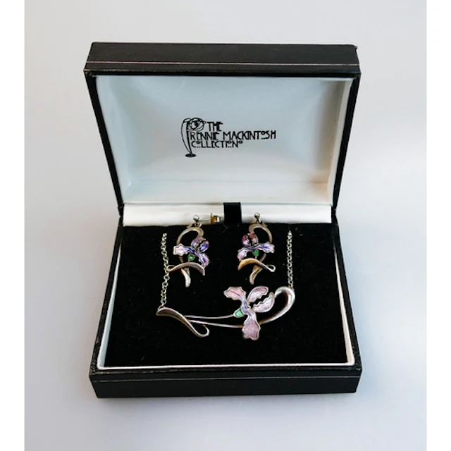 A Malcolm Gray silver and enamel iris decorated necklace wit...