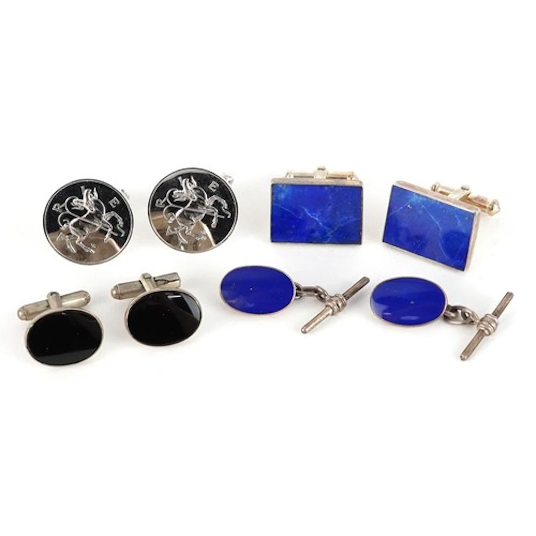 Four pairs of silver and white metal cufflinks including lap...
