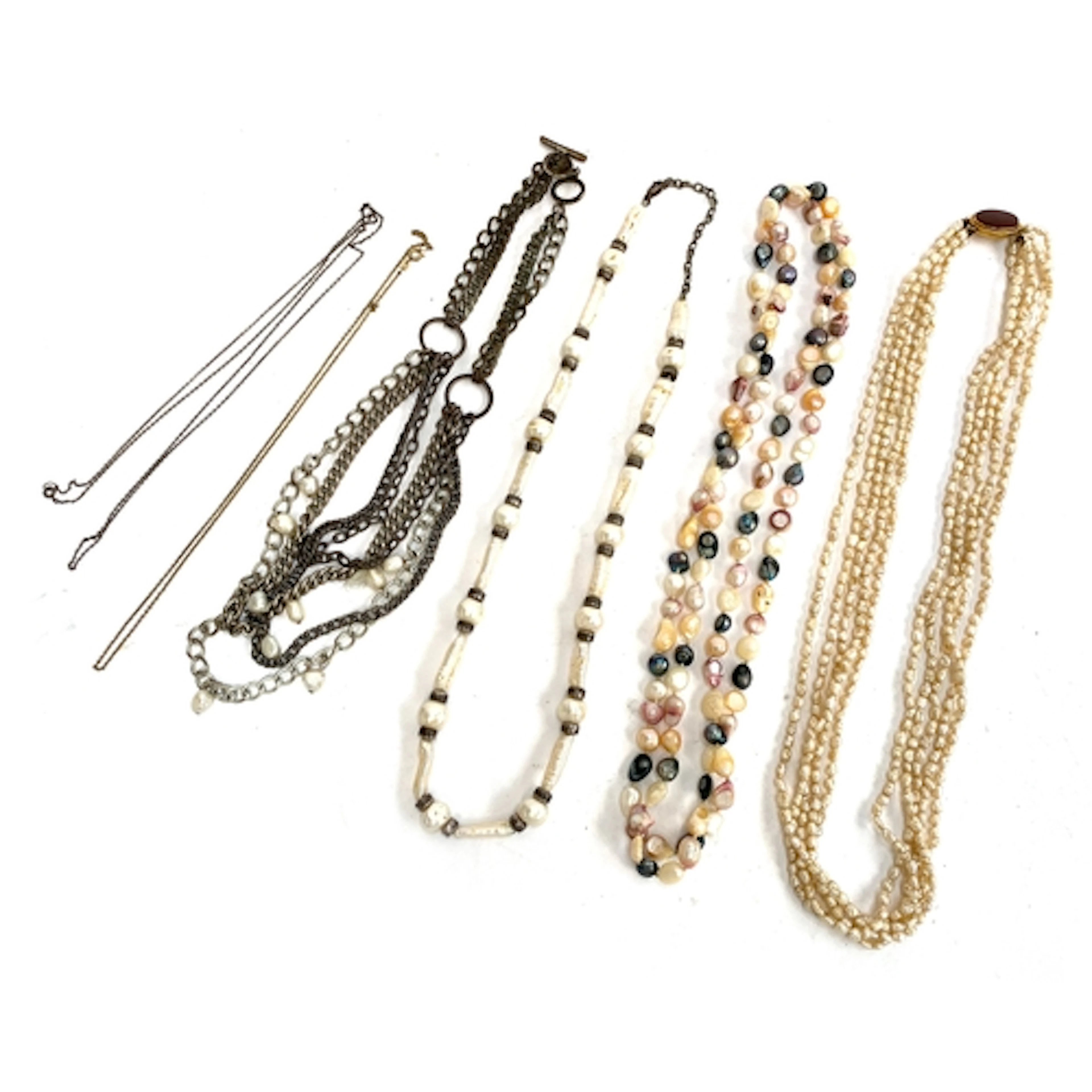 Three cultured pearl necklaces, one with keshi pearls and wh...