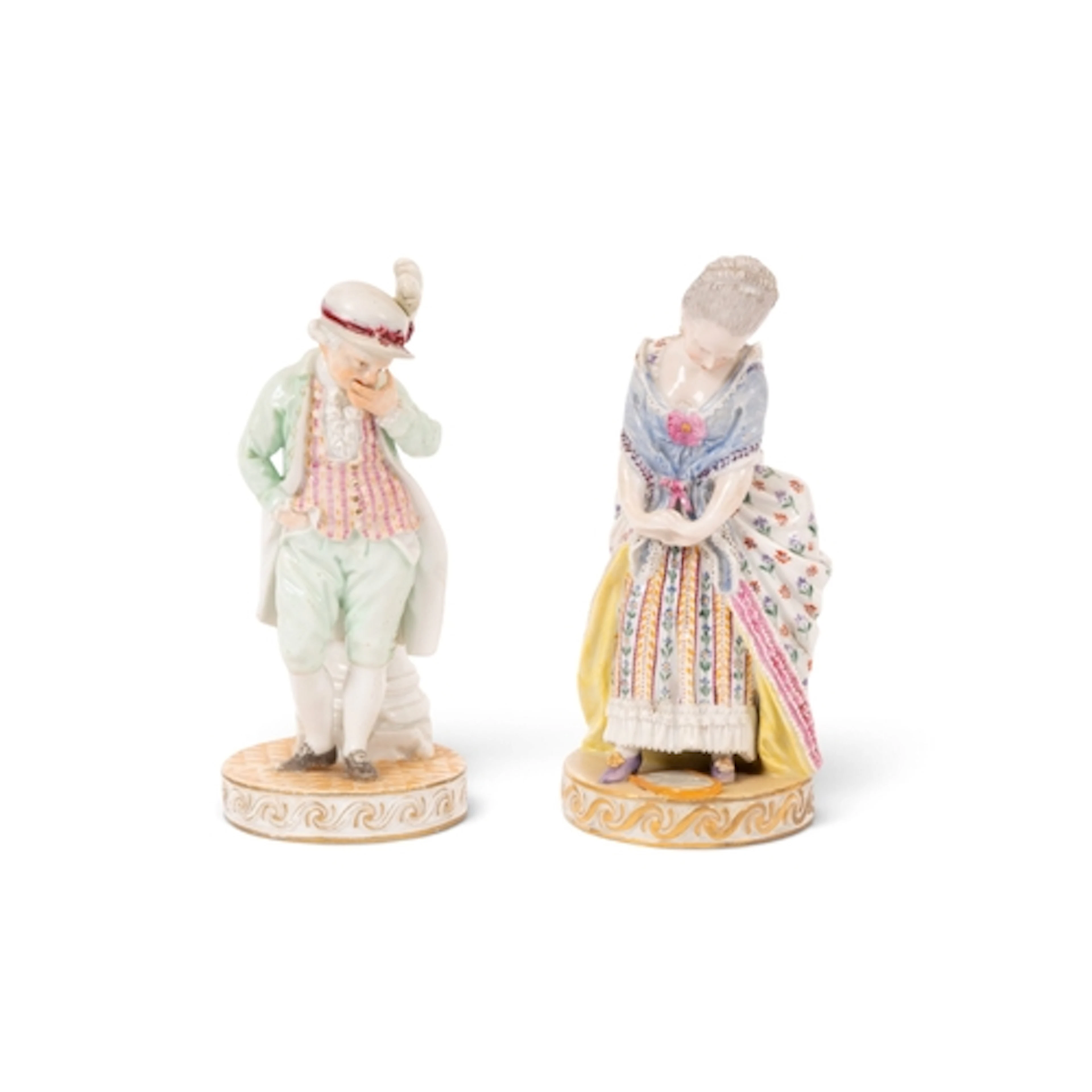 A matched pair of Meissen figures of The Broken Mirror and S...