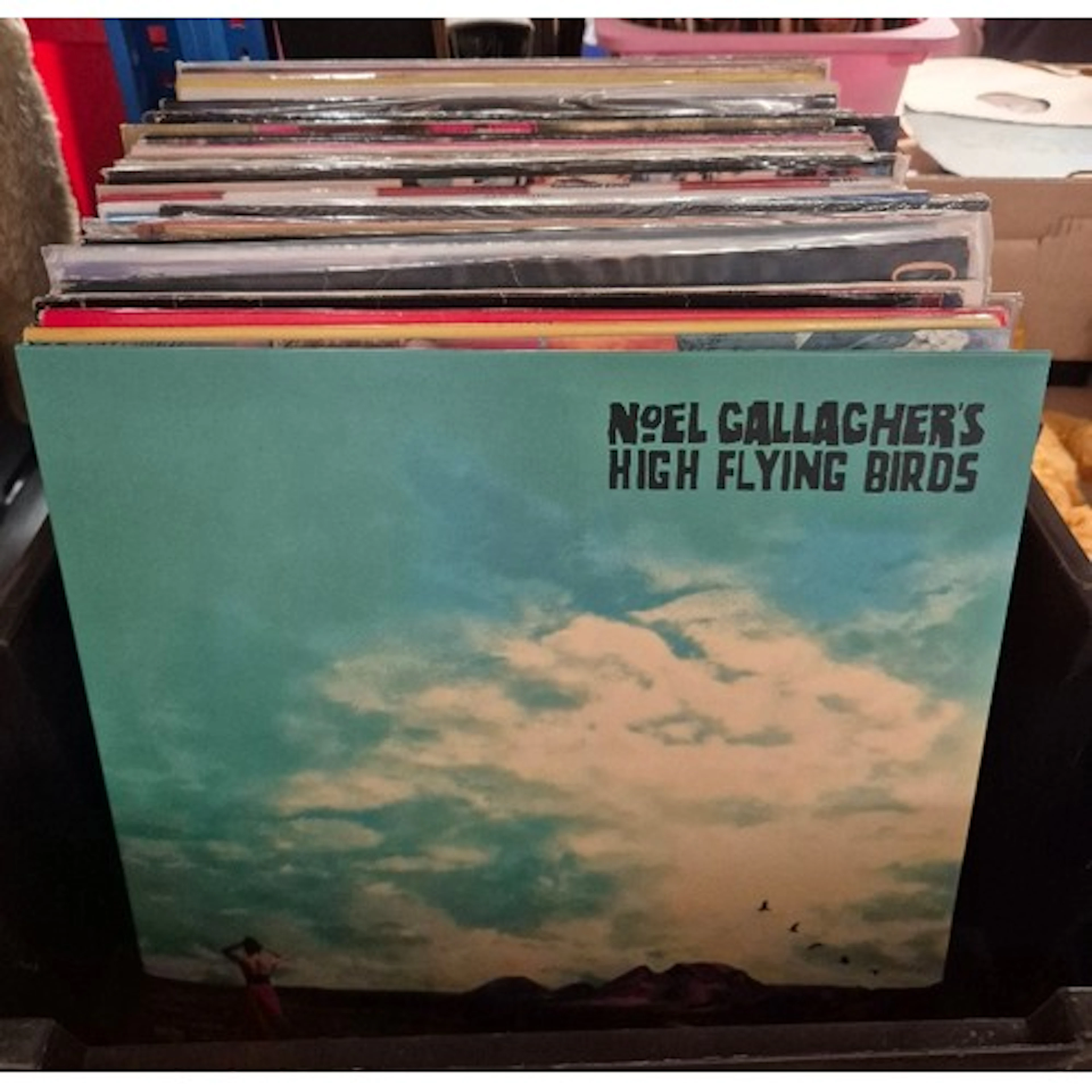 A box of LPs and 12" singles including Noel Gallagher, Fleet...
