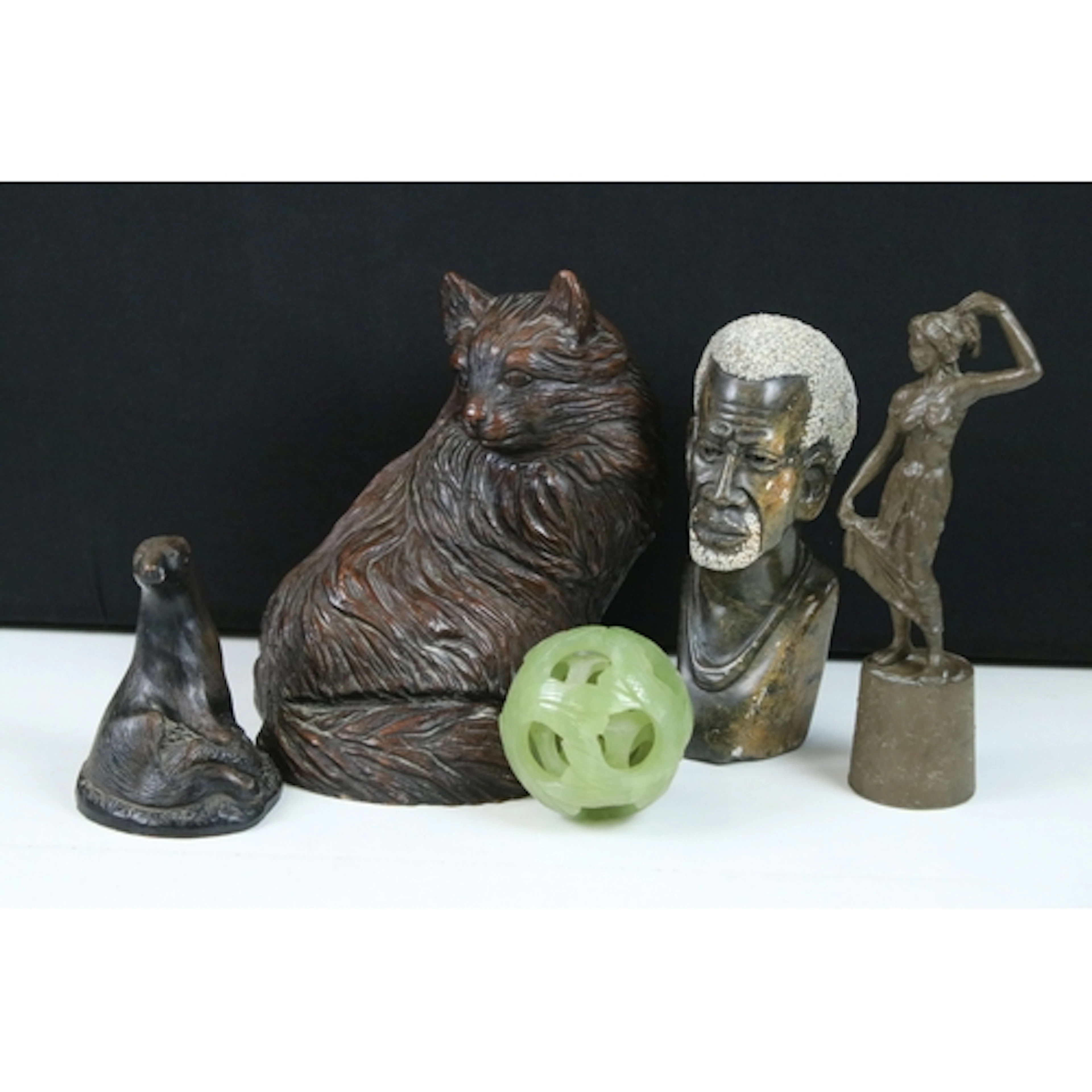 Carved Chinese jade puzzle ball together with a carved stone...