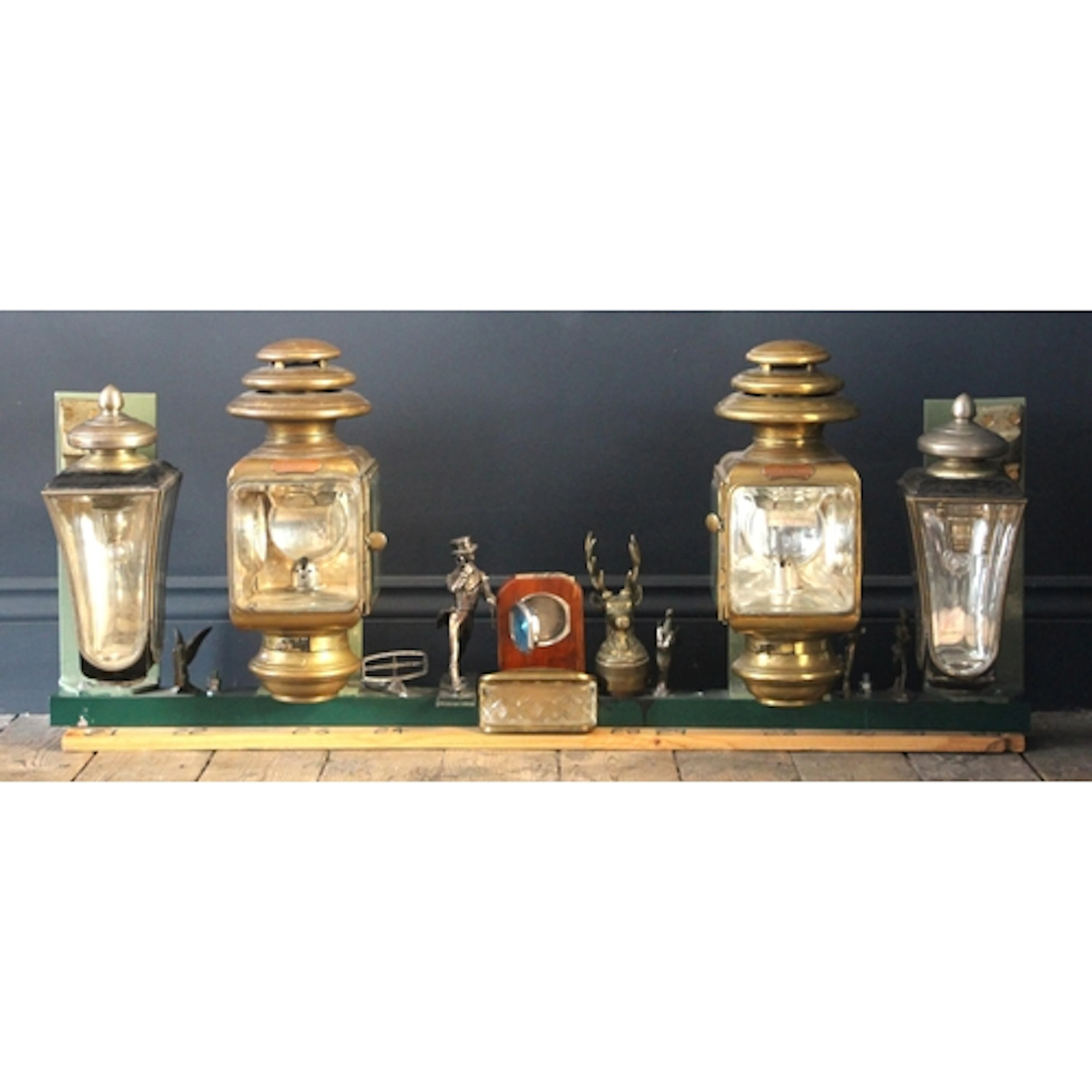 A vintage automobilia and item display, to include a Bentley...