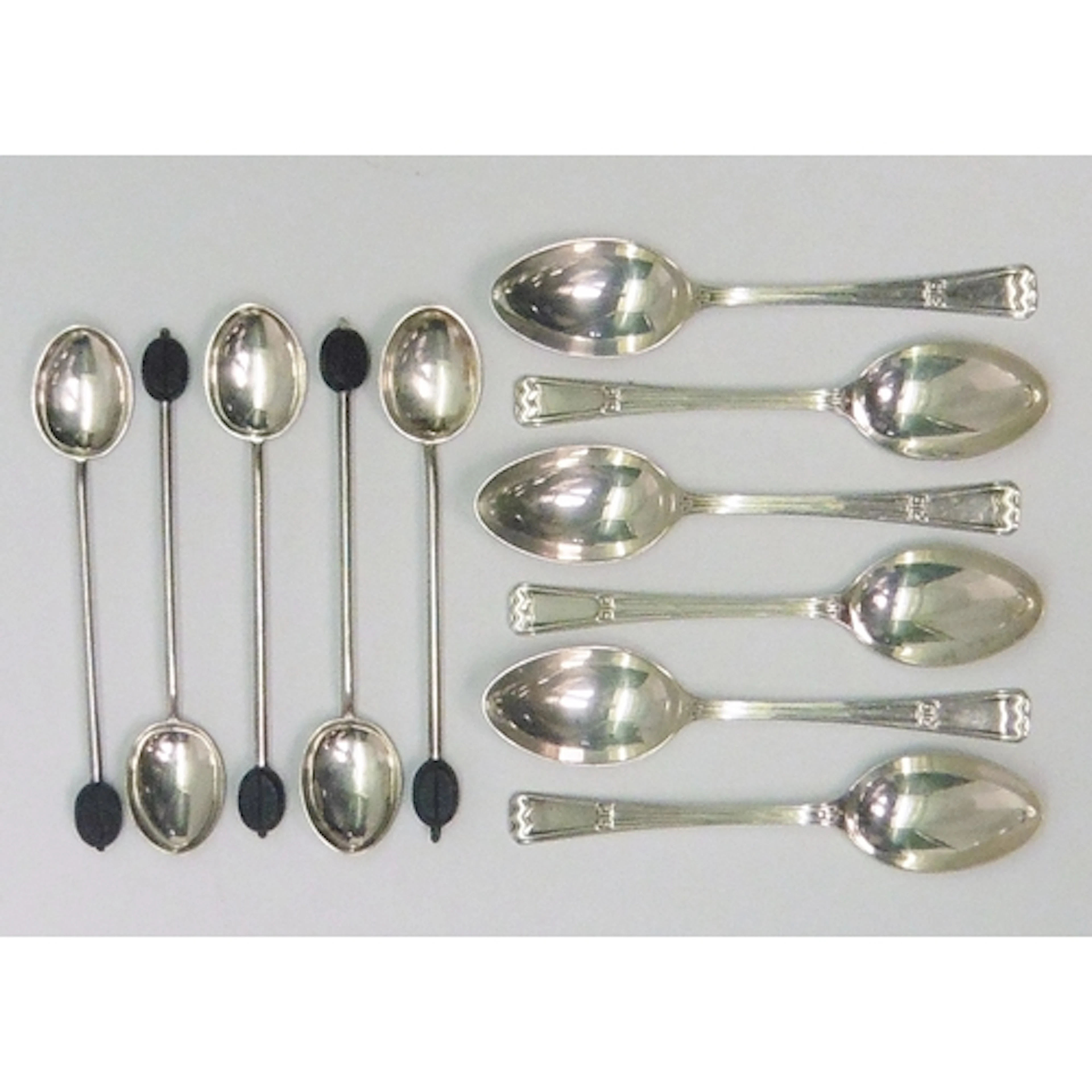 Six matching Art Deco influence coffee spoons, Elkington & C...