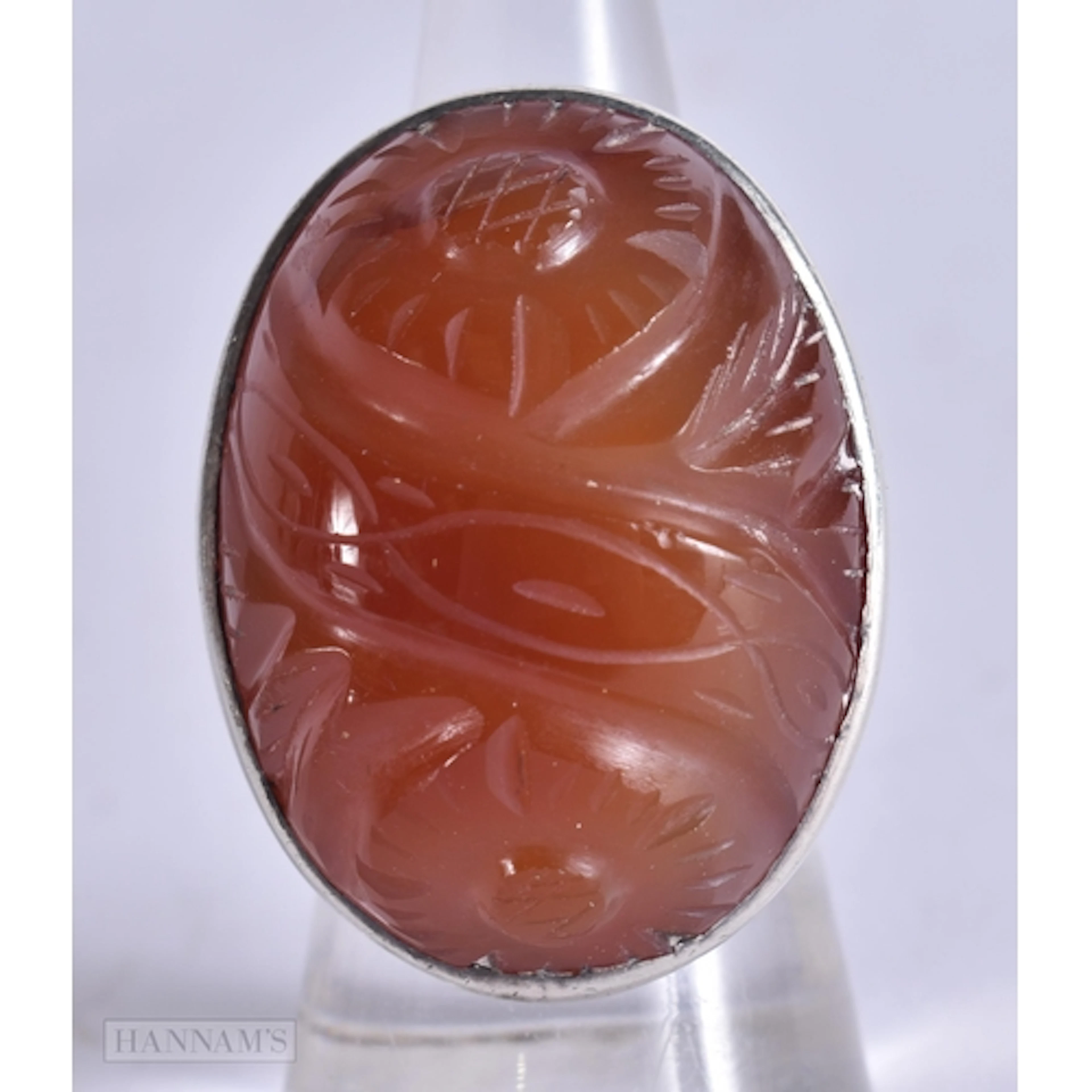 A SILVER AND CARNELIAN RING. 22.5 grams. N.