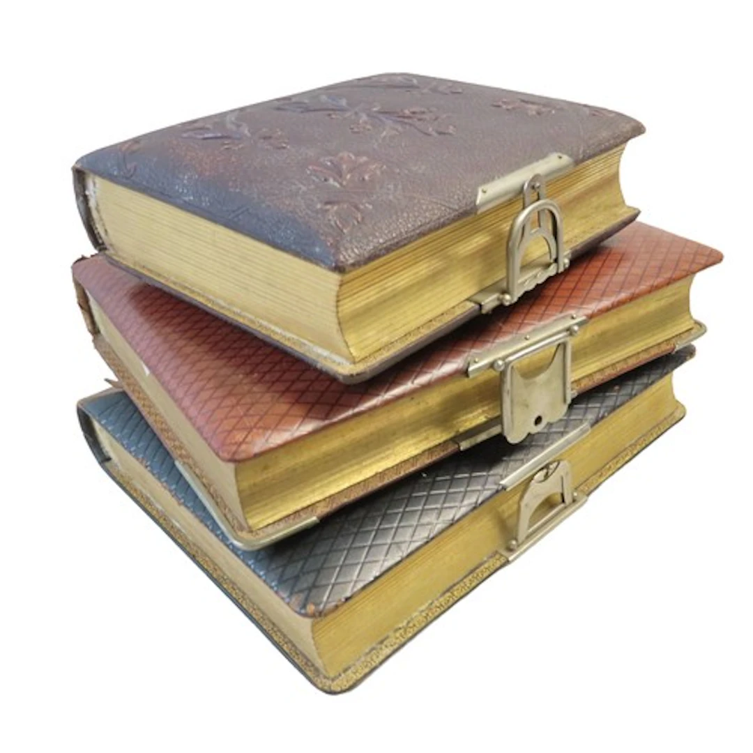THREE LATE VICTORIAN LEATHER BOUND PHOTO ALBUMS Mostly empty...