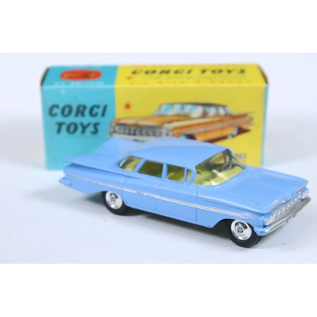 Boxed Corgi 220 Chevrolet Impala diecast model in pale blue,...