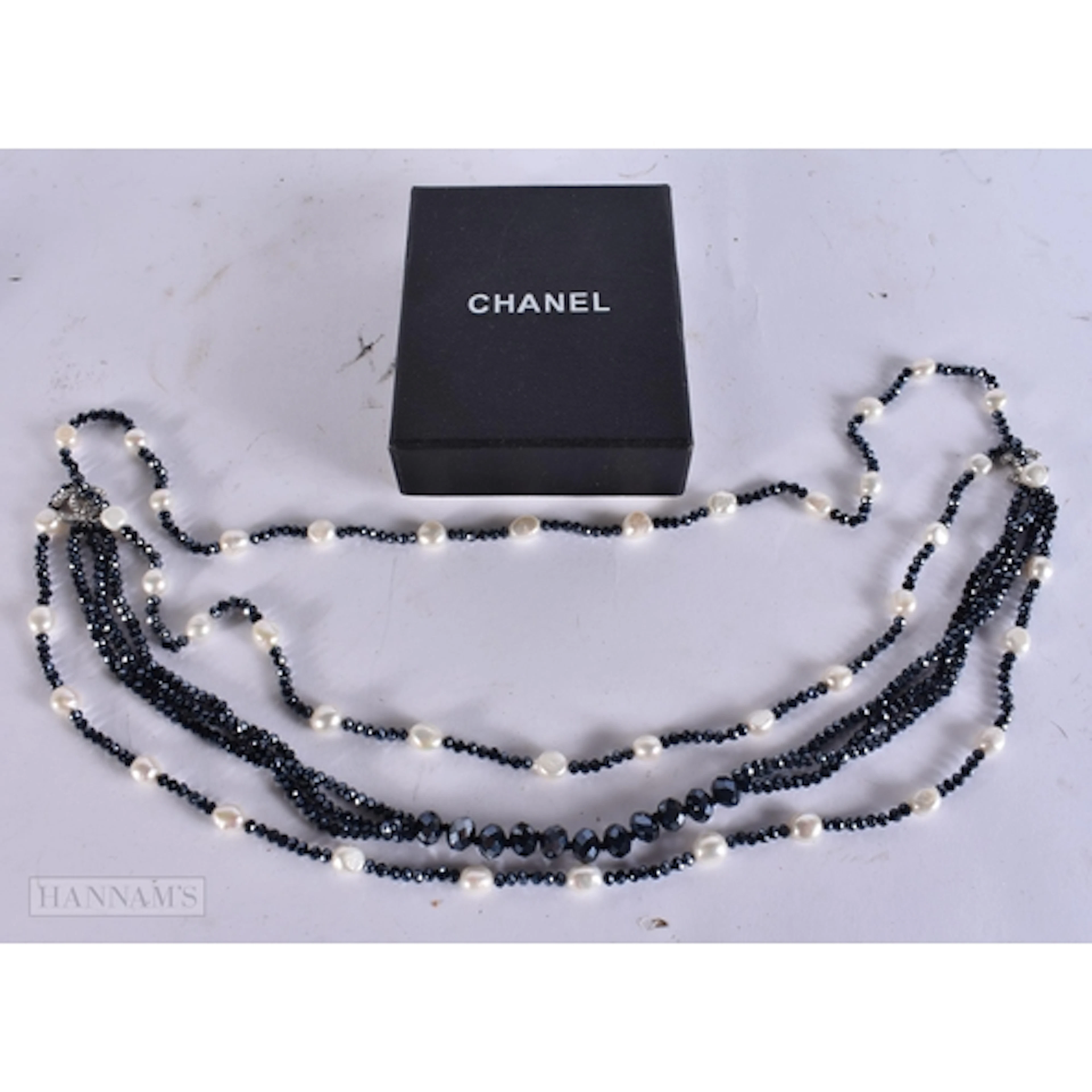 A BOXED CHANEL NECKLACE. 50 cm long.