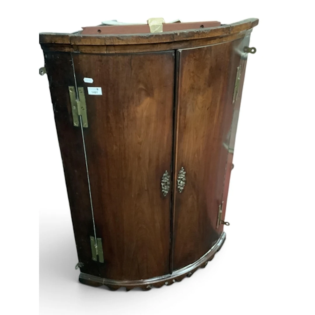 XIX Century Mahogany Bow Fronted Corner Cupboard with two fi...