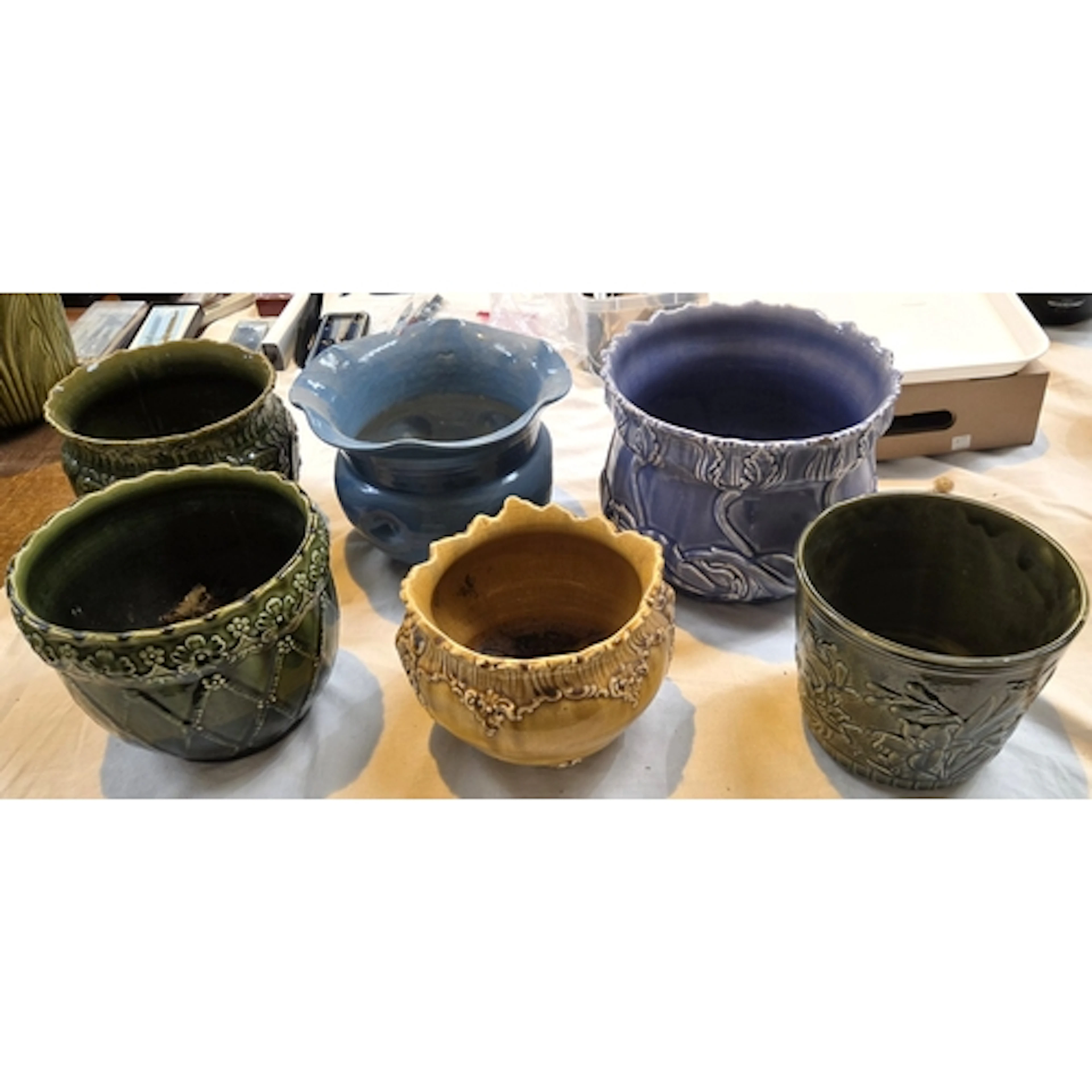 A collection of 6 1930's glazed Bretby and other style of ja...
