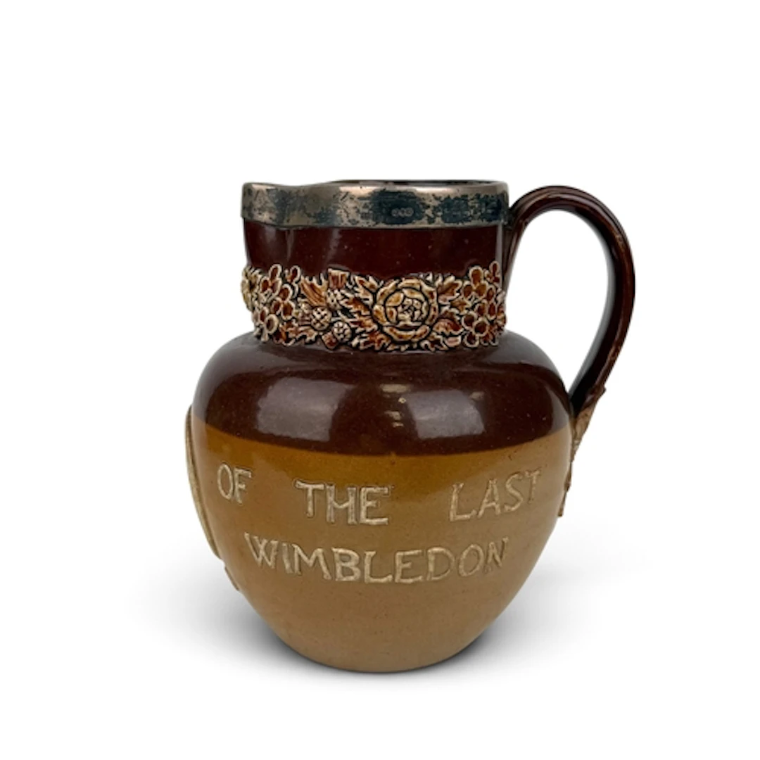 A DOULTON LAMBETH SALT-GLAZED STONEWARE SILVER MOUNTED JUG, ...