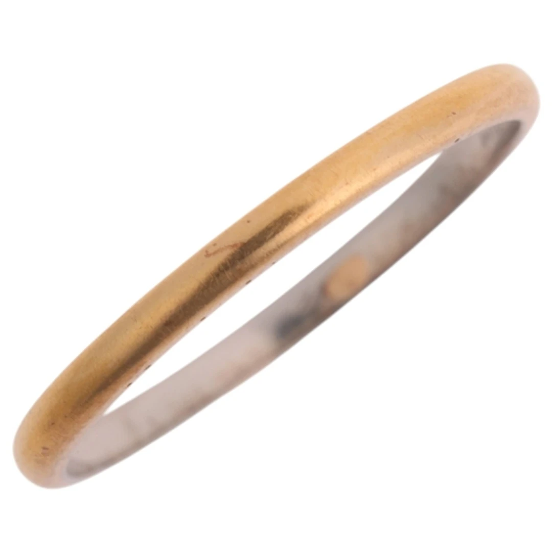 An Antique platinum and 22ct gold wedding band ring, band wi...