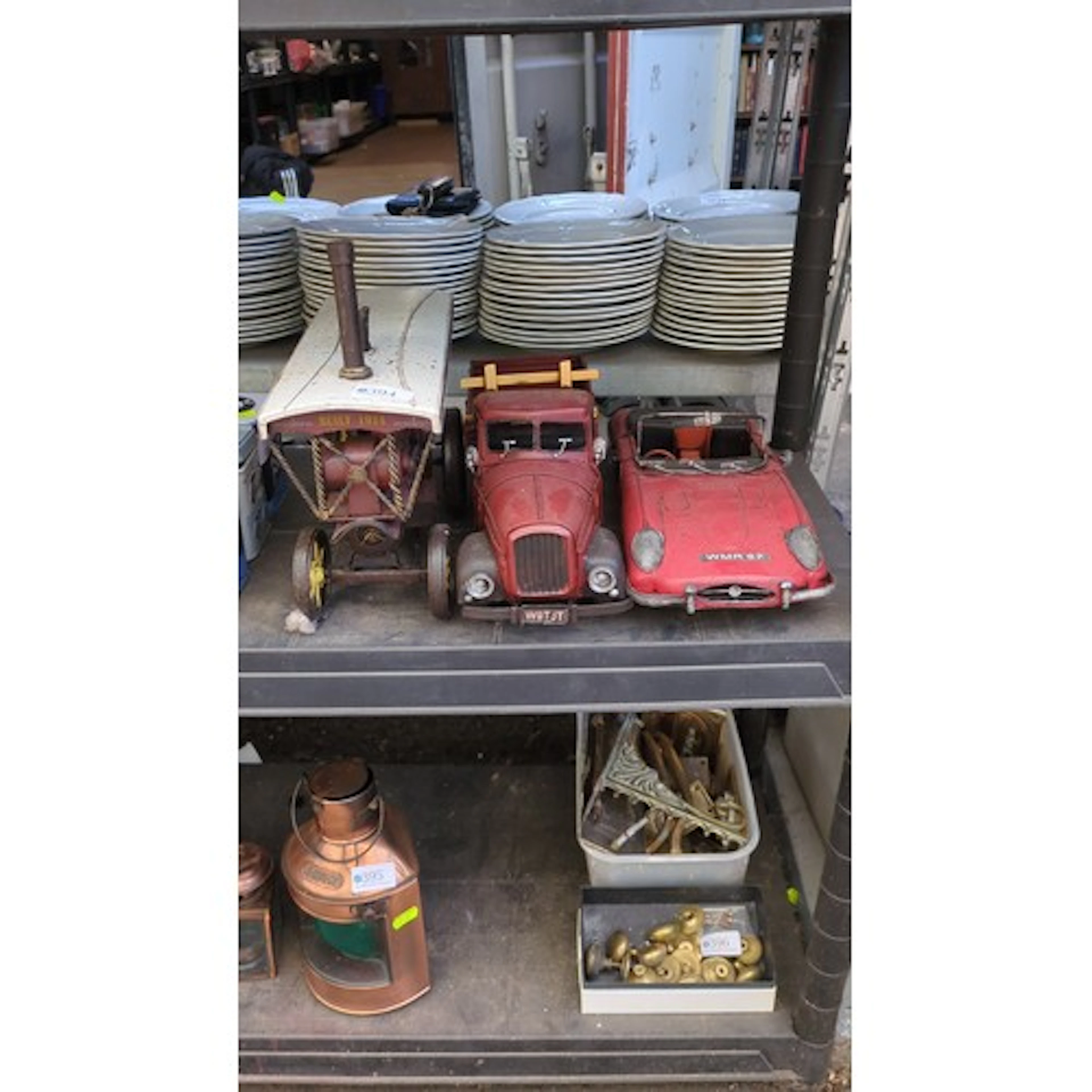 Three painted metal model vehicles comprising a traction eng...