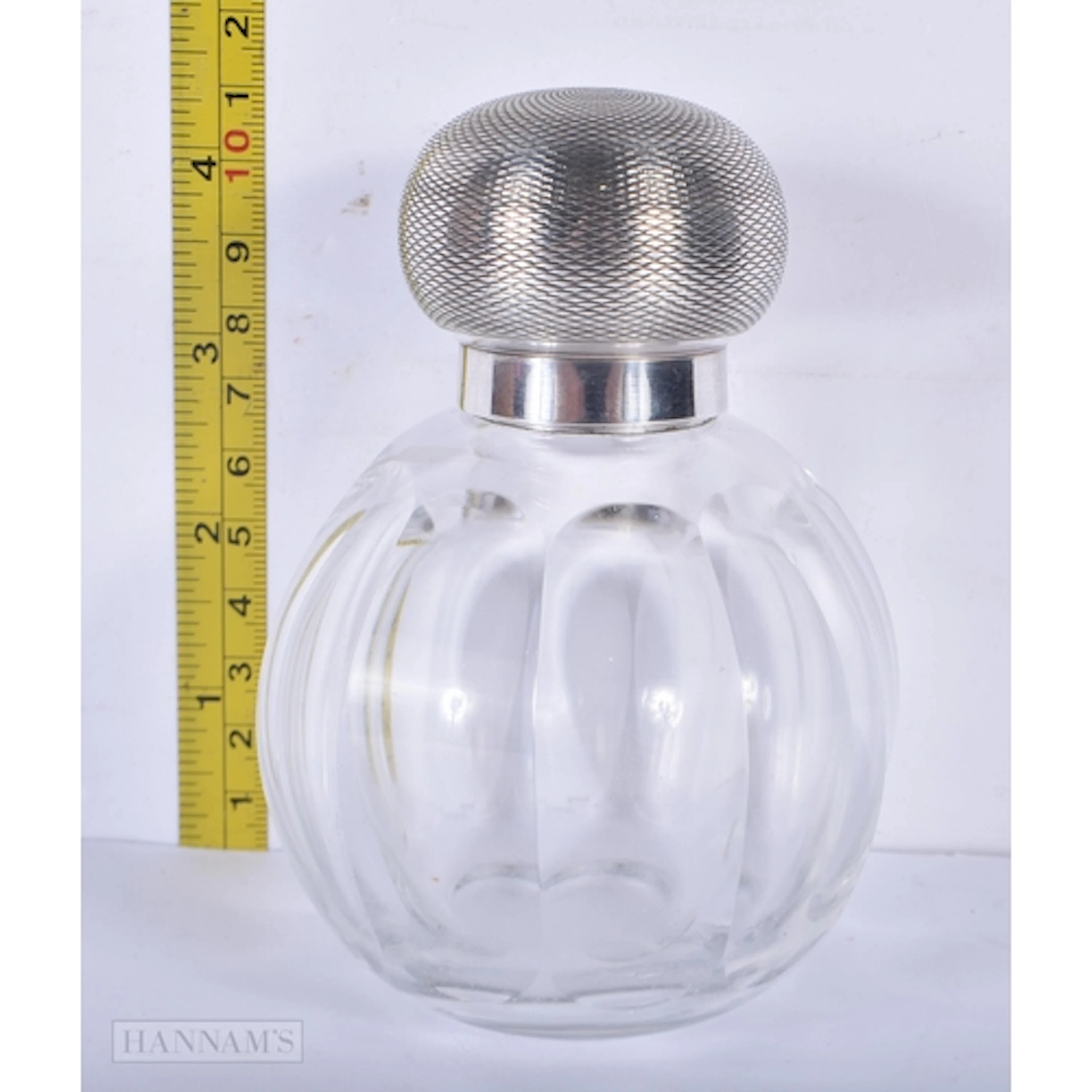 A sterling silver topped glass scent bottle 12cm