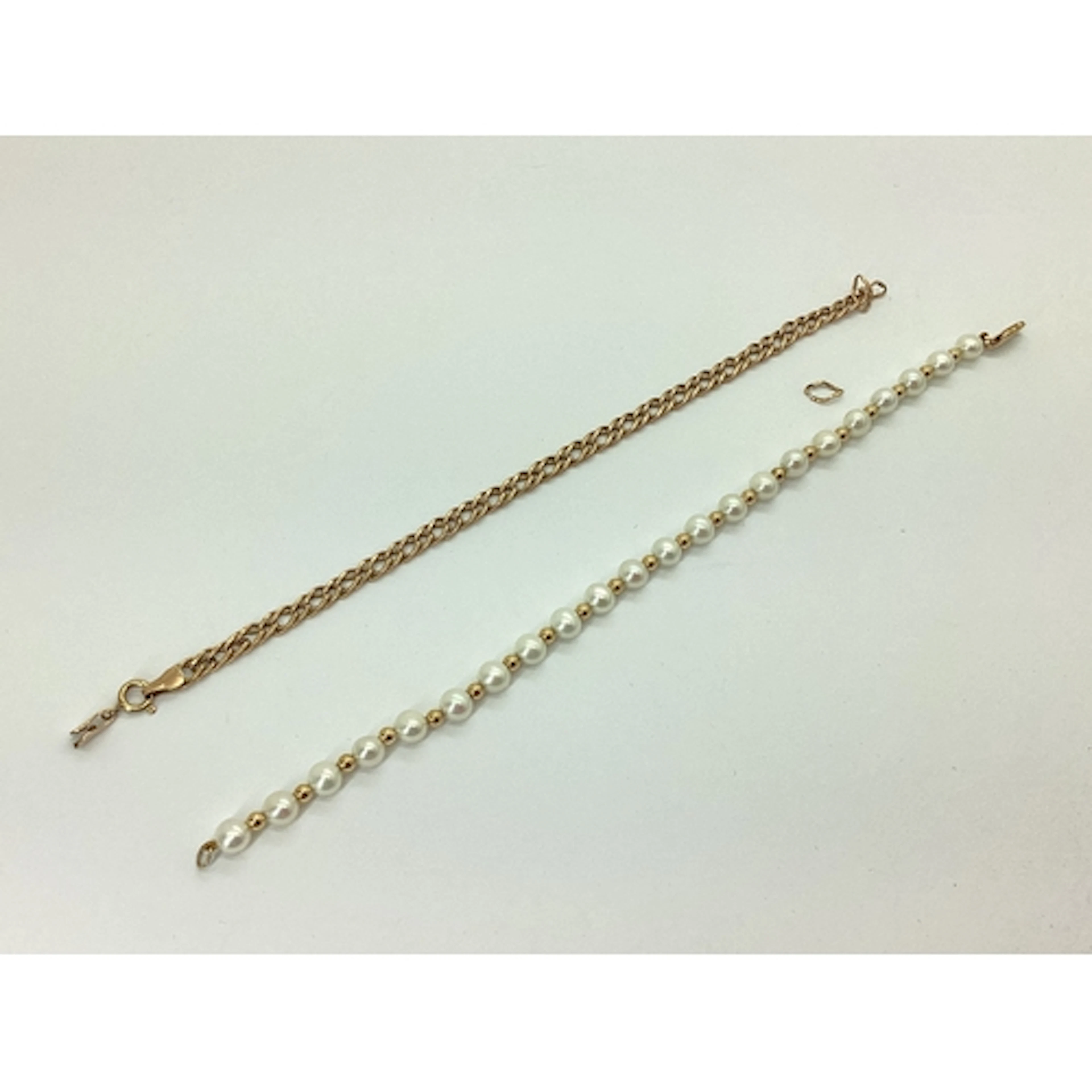 A 9ct Gold Fancy Link Bracelet, (damaged / broken); together...