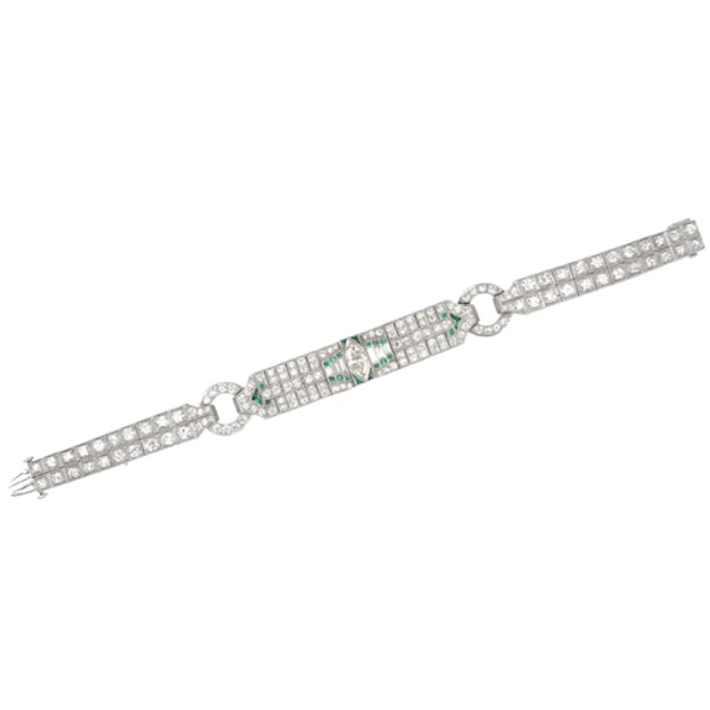 An Art Deco emerald and diamond bracelet, centring on a marq...