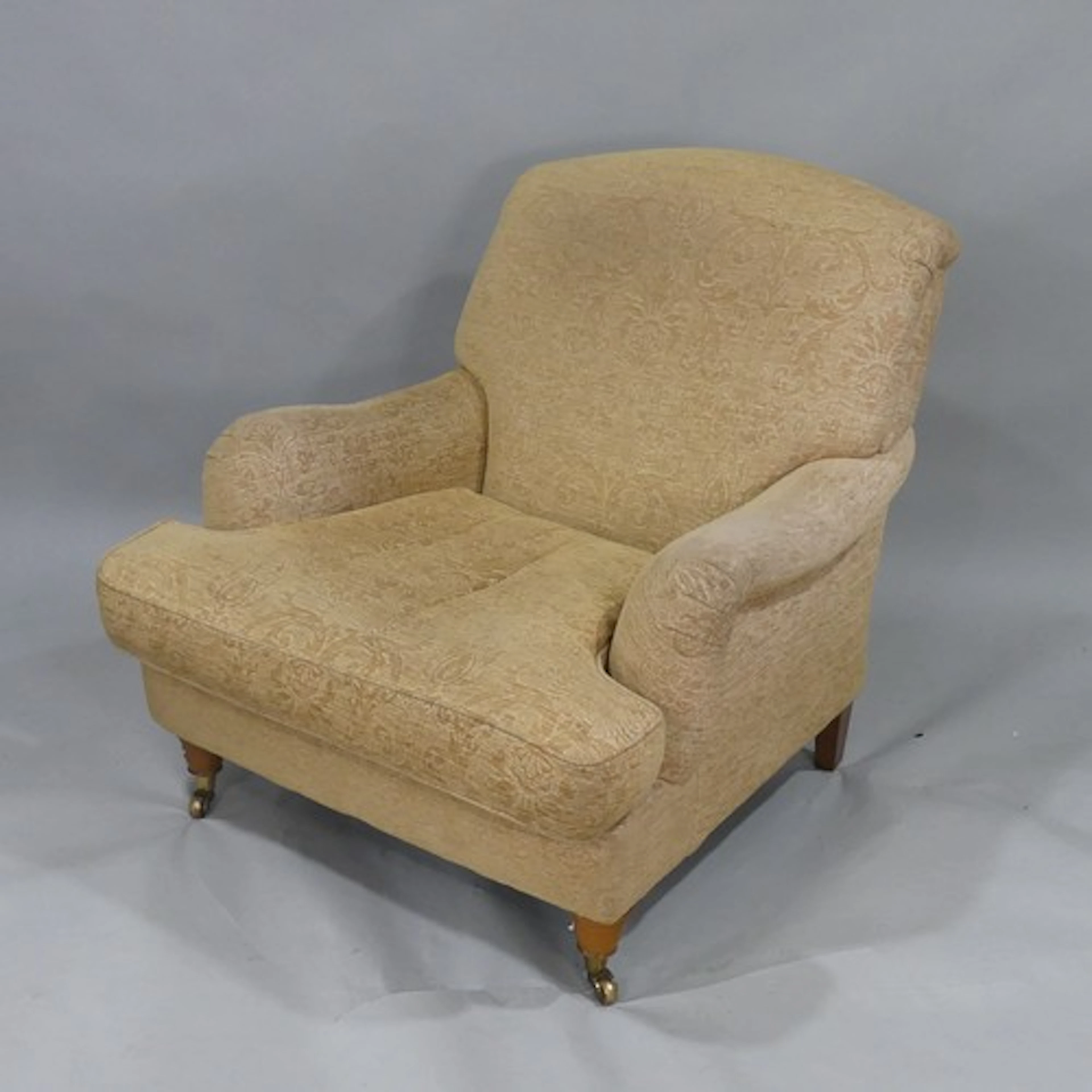 A 20th/21st century Howard-style Armchair, by Laura Ashley, ...