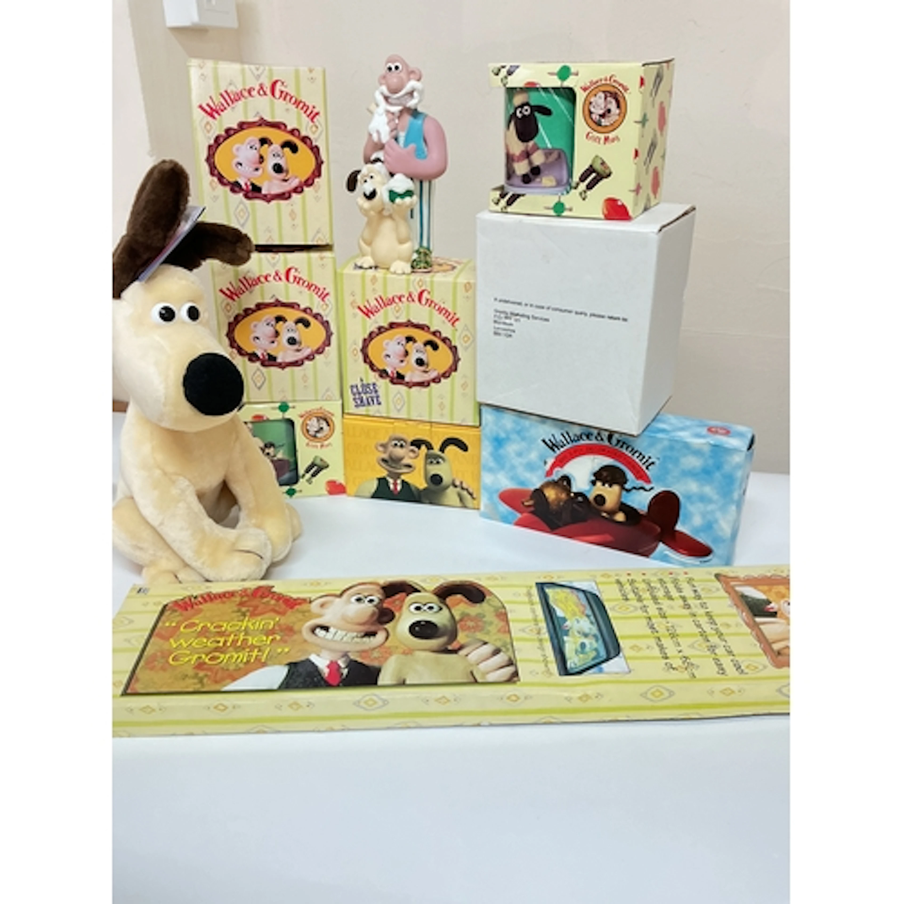 A Box Containing Wallace And Gromit Ephemera.