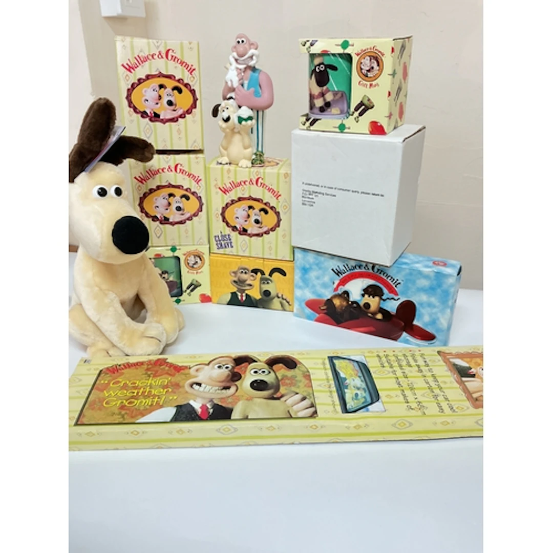 A Box Containing Wallace And Gromit Ephemera.