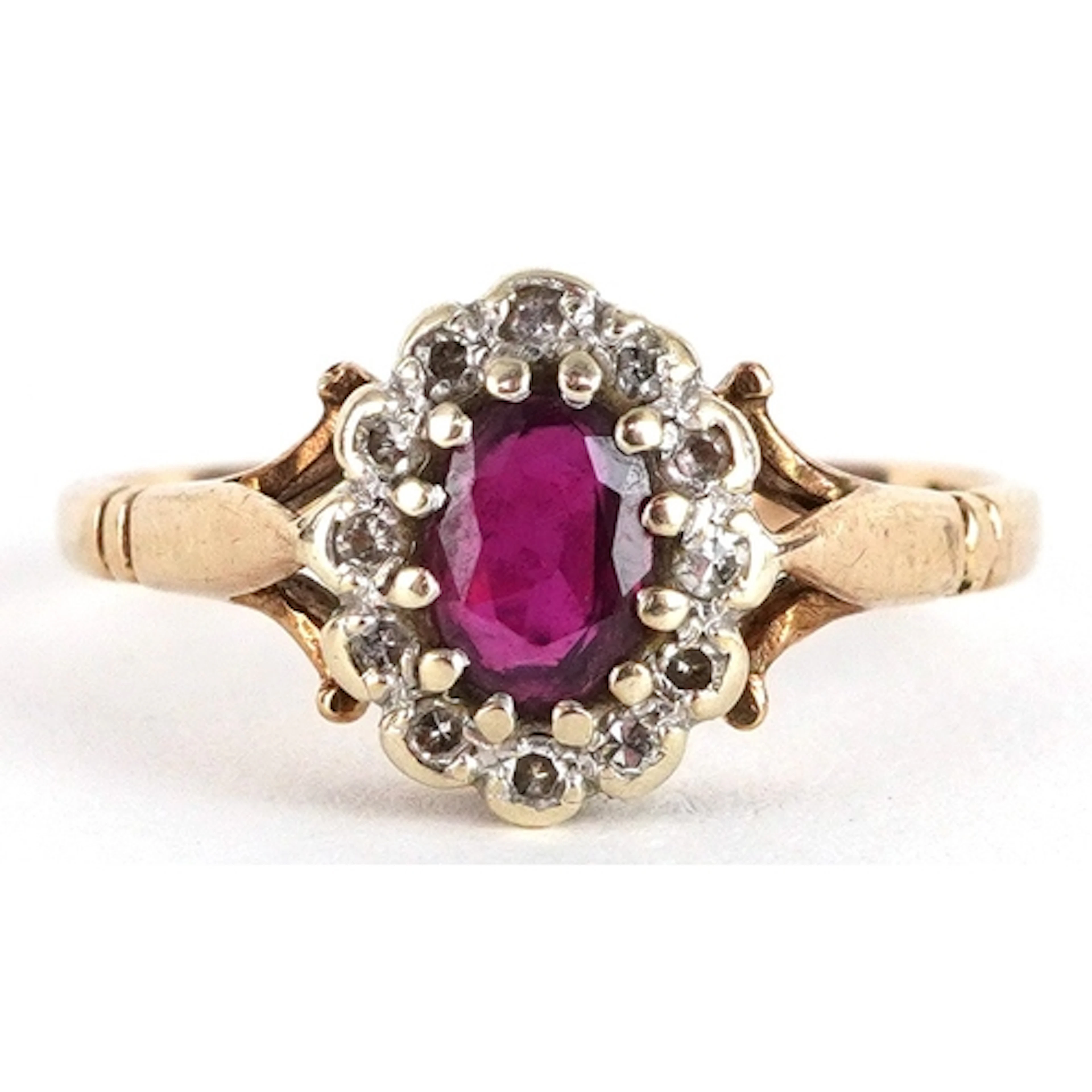 9ct gold ruby and diamond cluster ring, size M/N, 2.2g.
