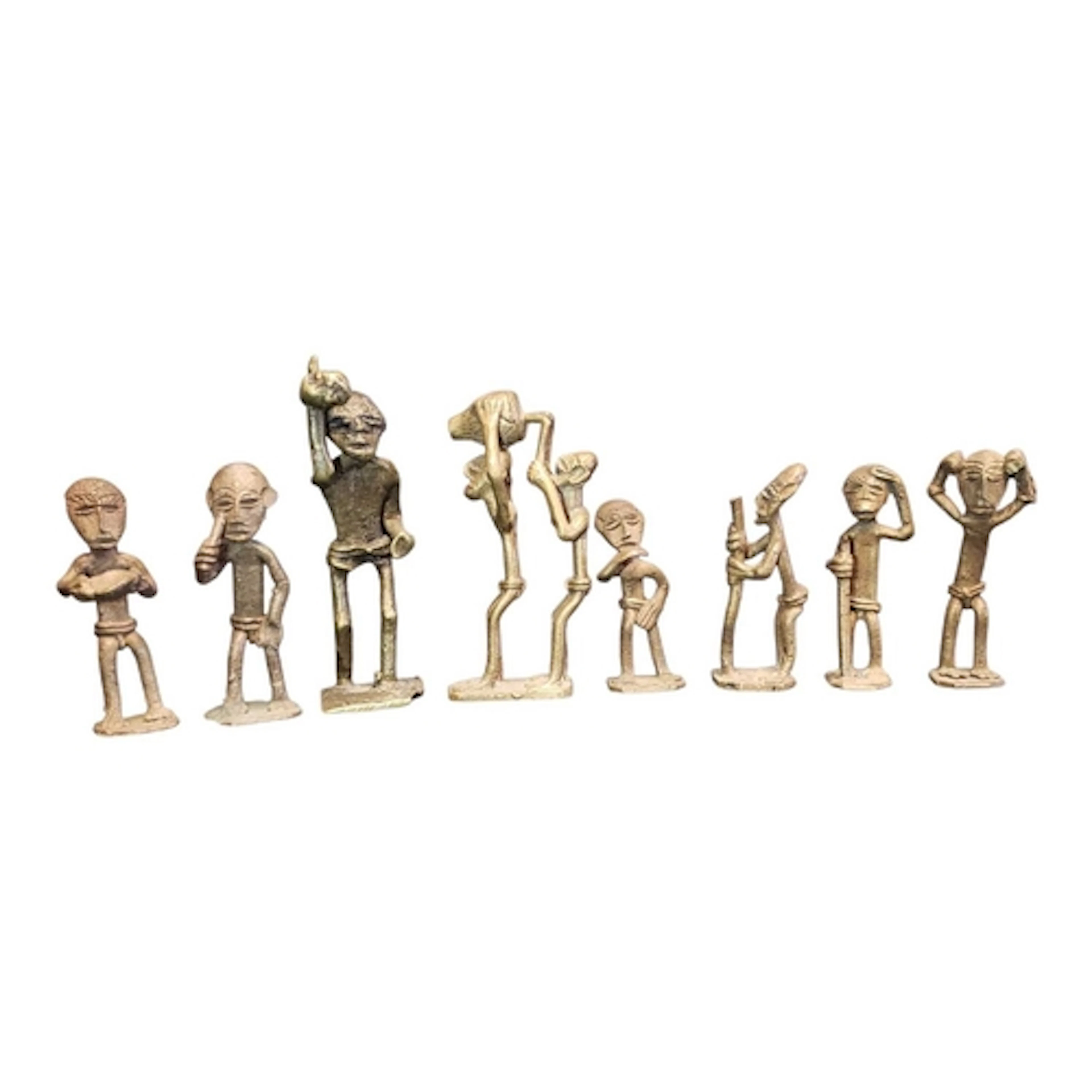 A collection of African Ashanti brass weights of figural for...