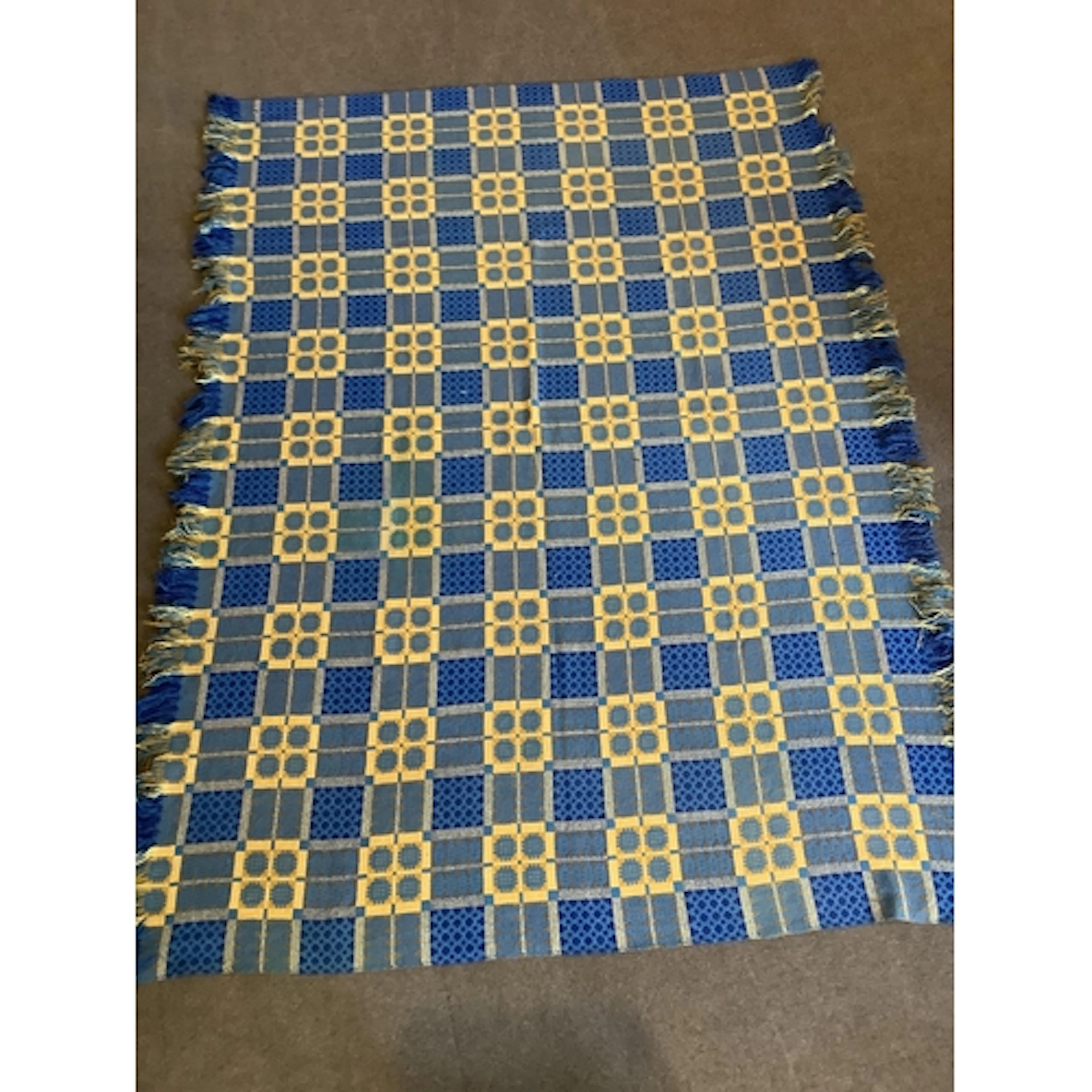 A 20th century blue and yellow Caernarfon (or Portcullis) ge...