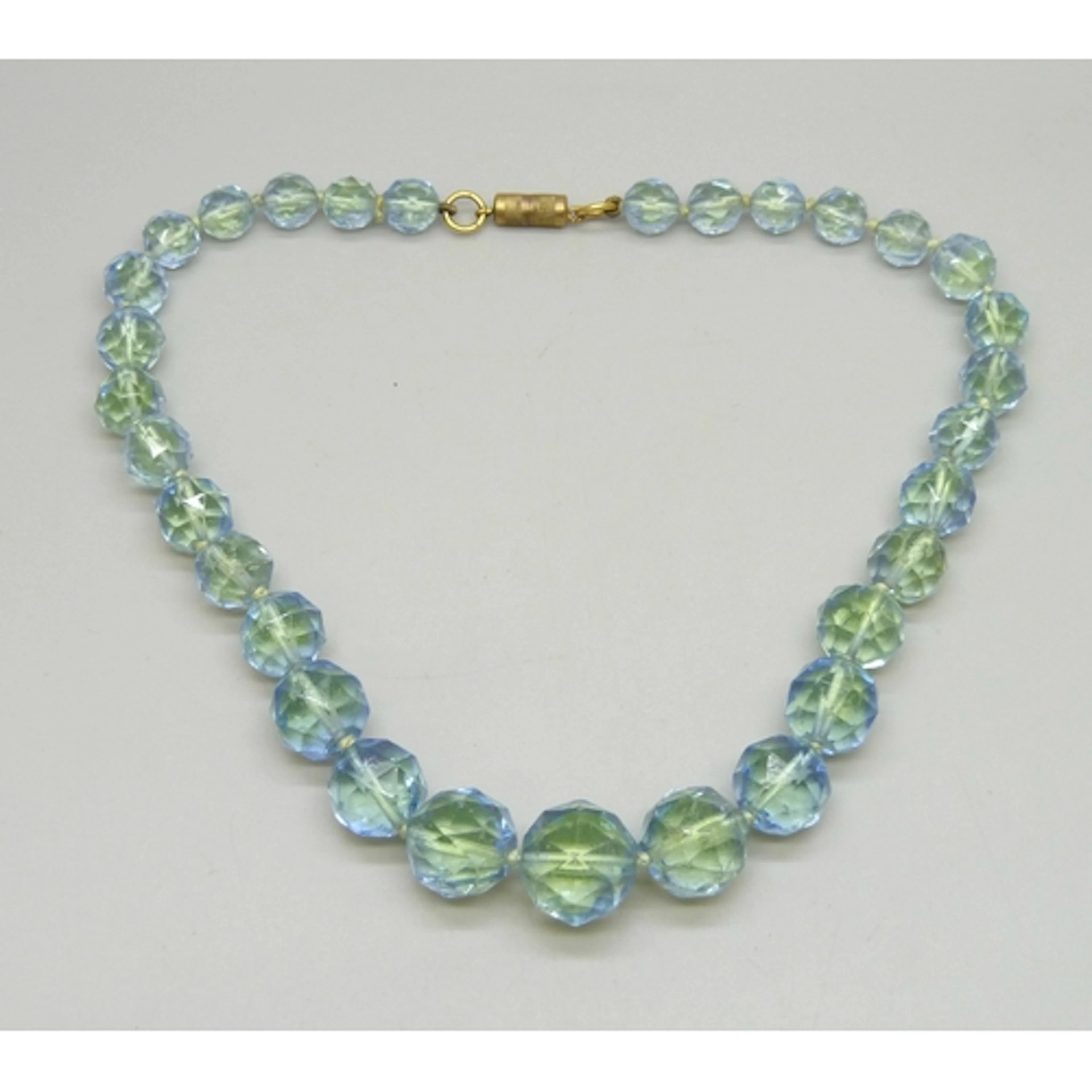 A circa 1930s Art Deco uranium faceted glass bead necklace, ...