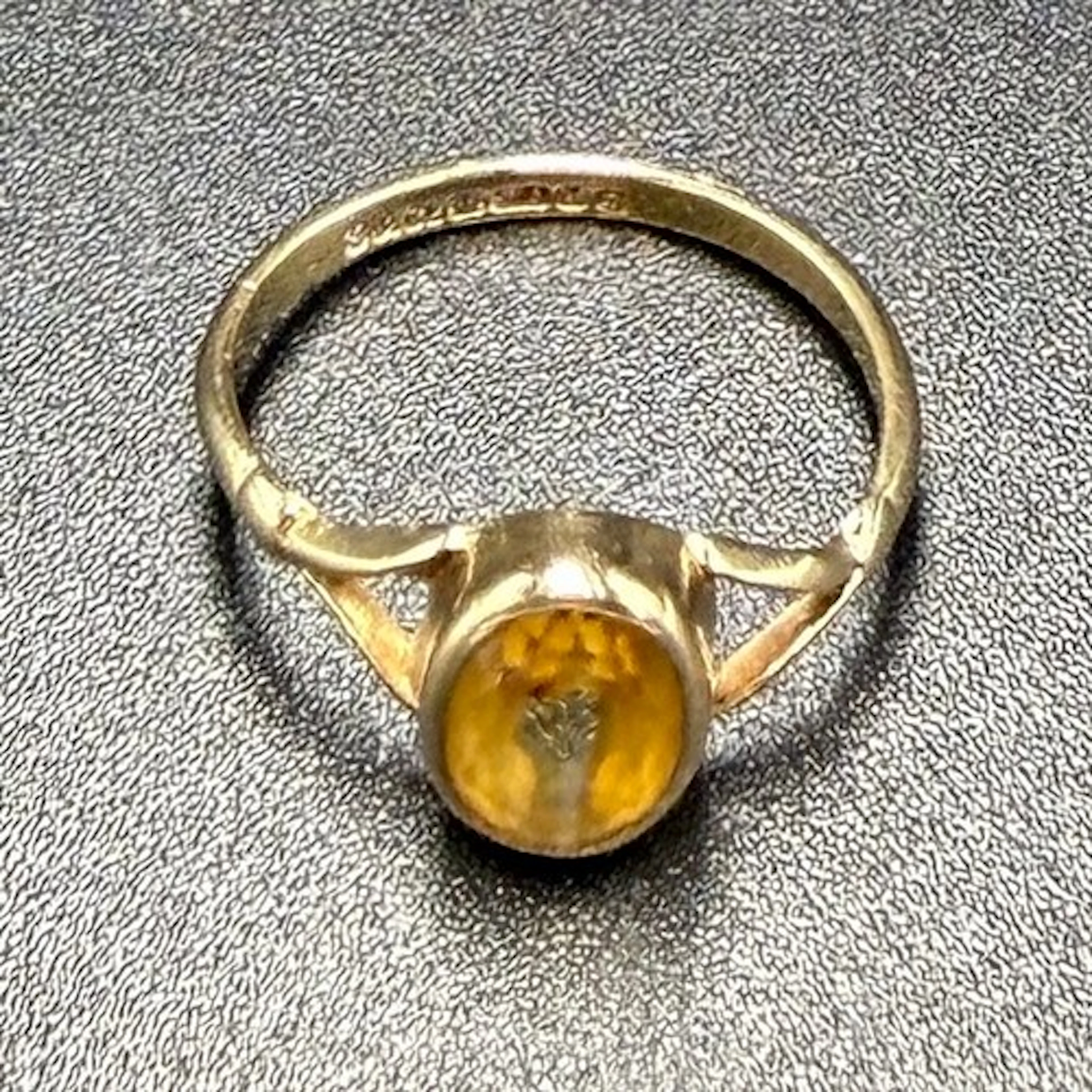 A 9 carat gold ring set with citrine. Size J, weight 1.4gm.