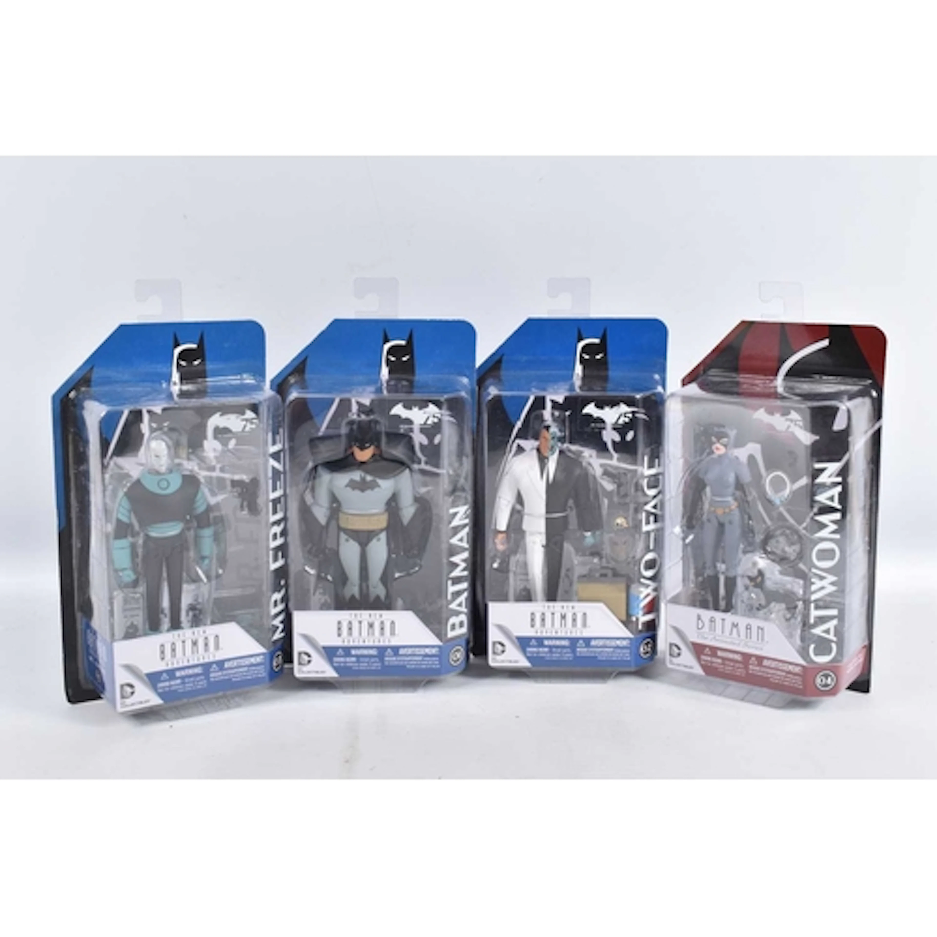 FOUR BOXED SEALED BLISTER DC COLLECTIBLES 75 YEARS OF BATMAN...