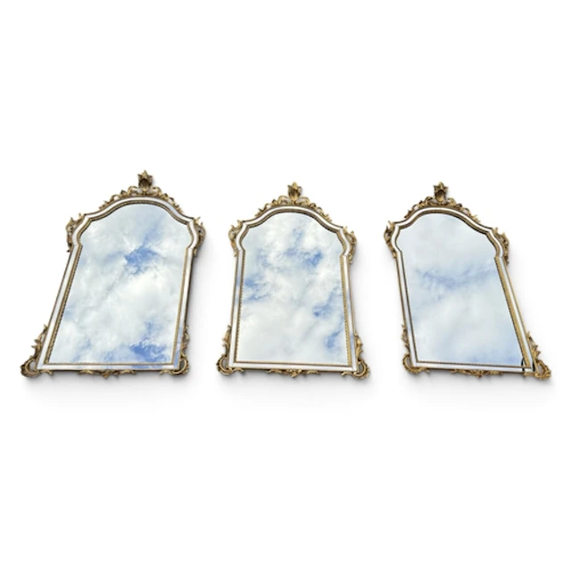 A SET OF THREE REPRODUCTION GILTWOOD AND GESSO FRAME MARGINA...