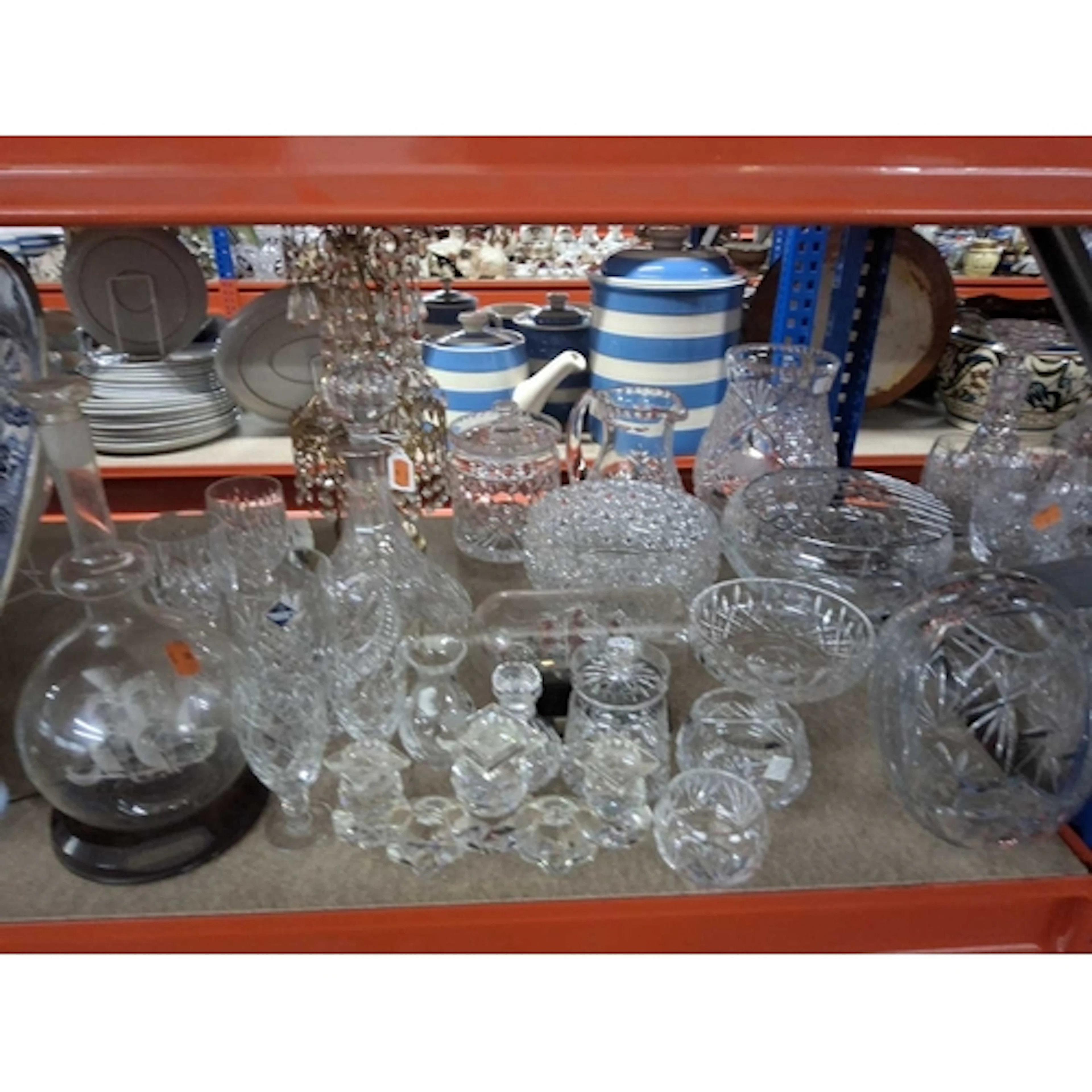 A GROUP OF CRYSTAL AND CUT GLASS ITEMS comprising a ship in ...