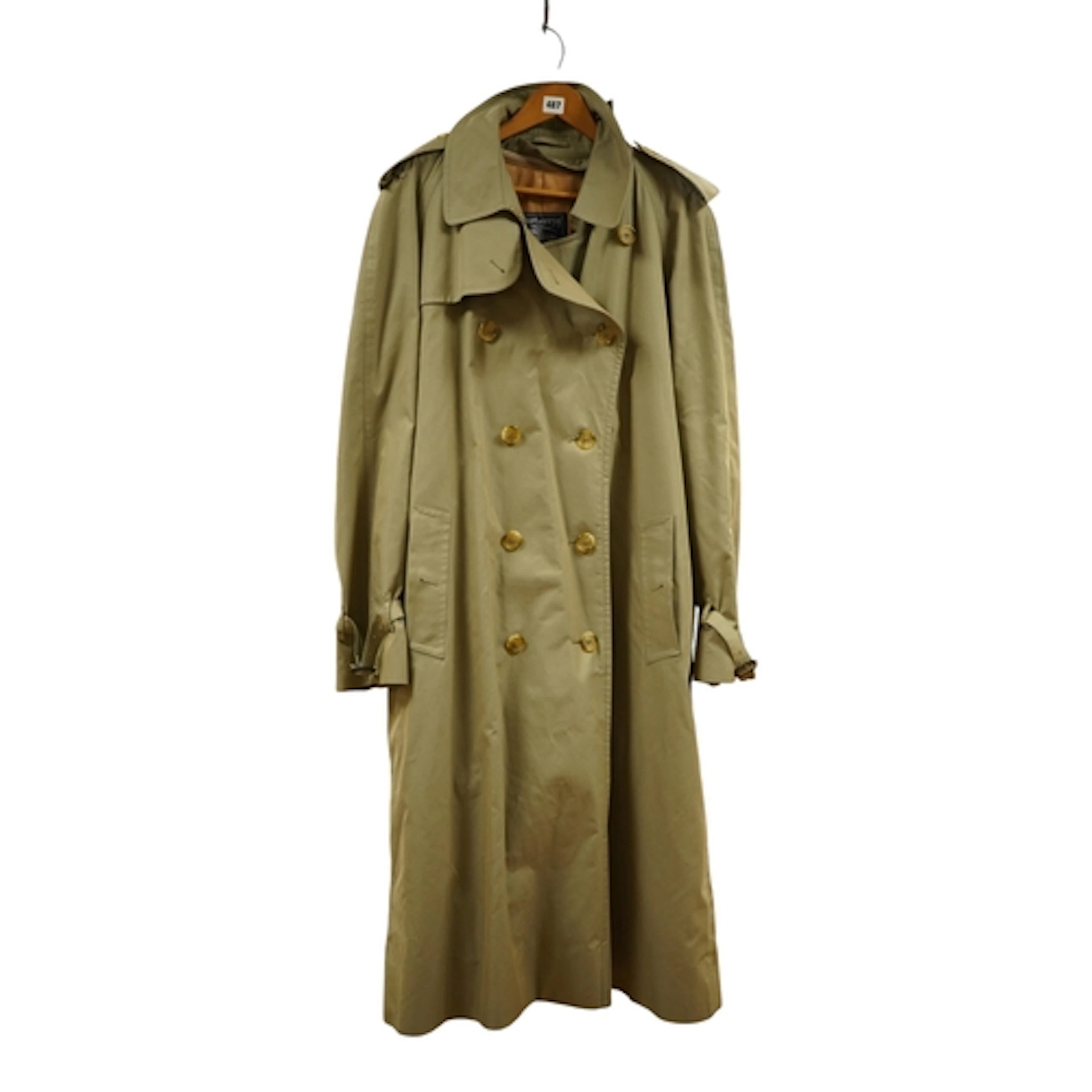 A gentlemans Burberry trenchcoat with detachable wool liner,...
