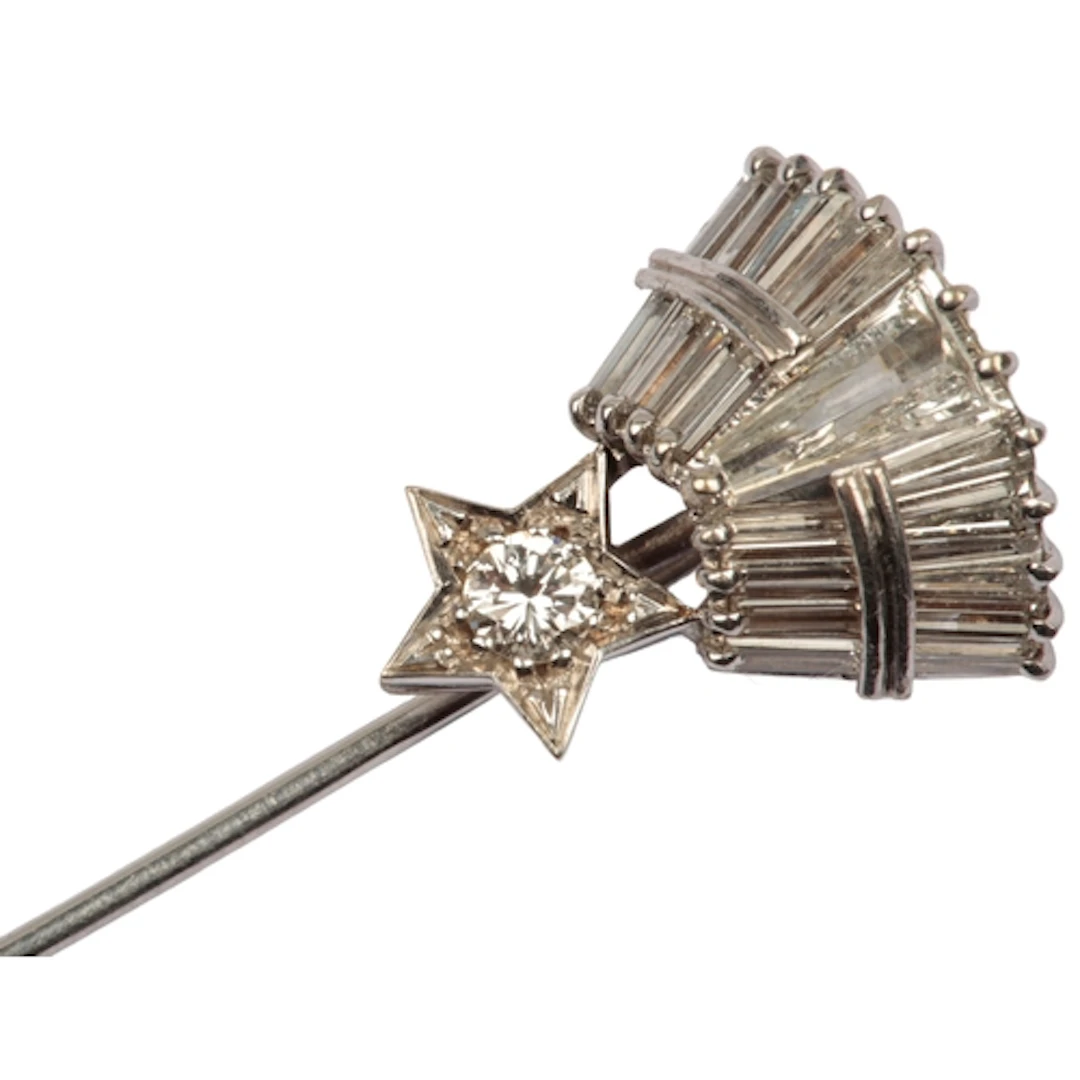 A diamond stick pin, mid 20th century, designed as a shootin...