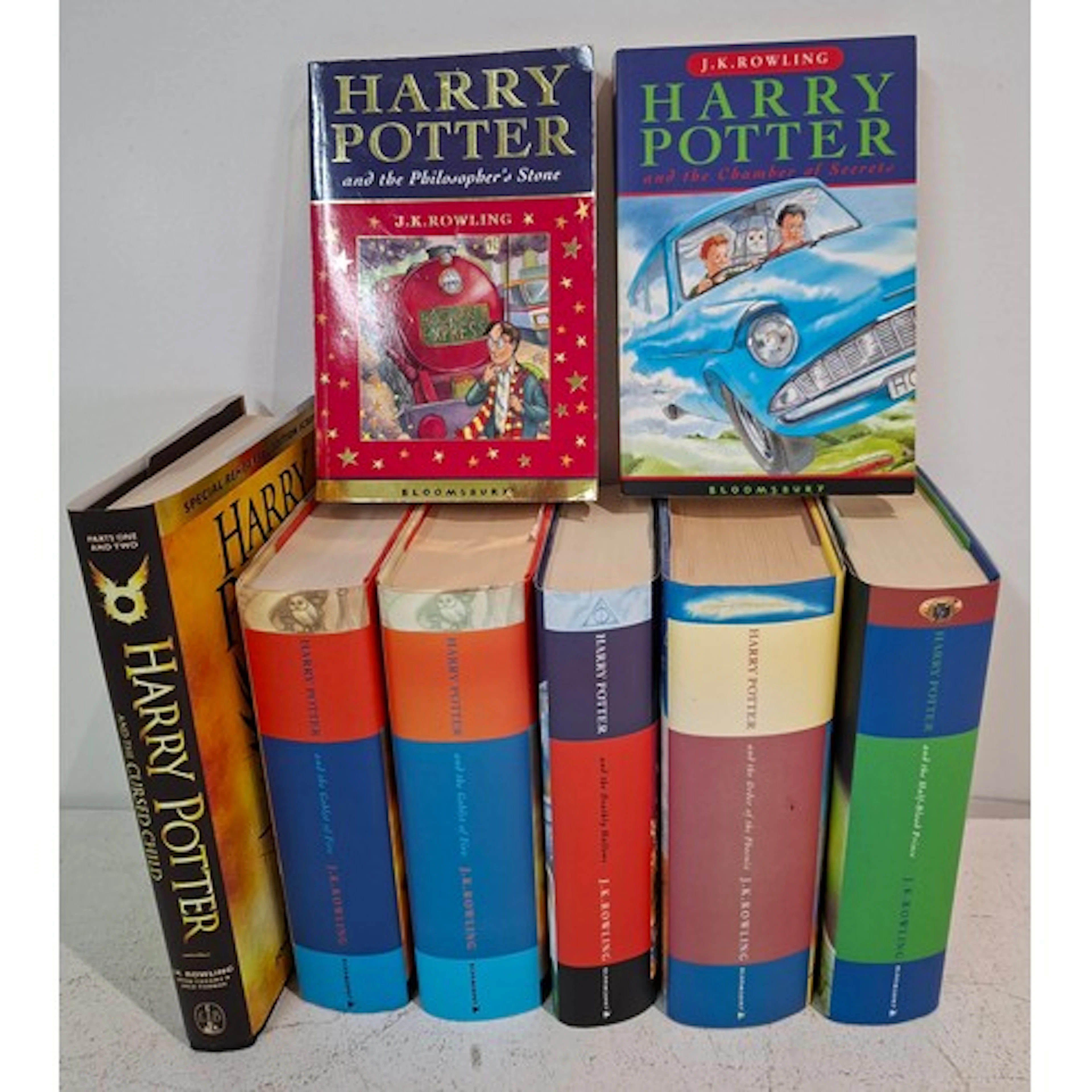 A collection of Harry Potter books to include First Editions...