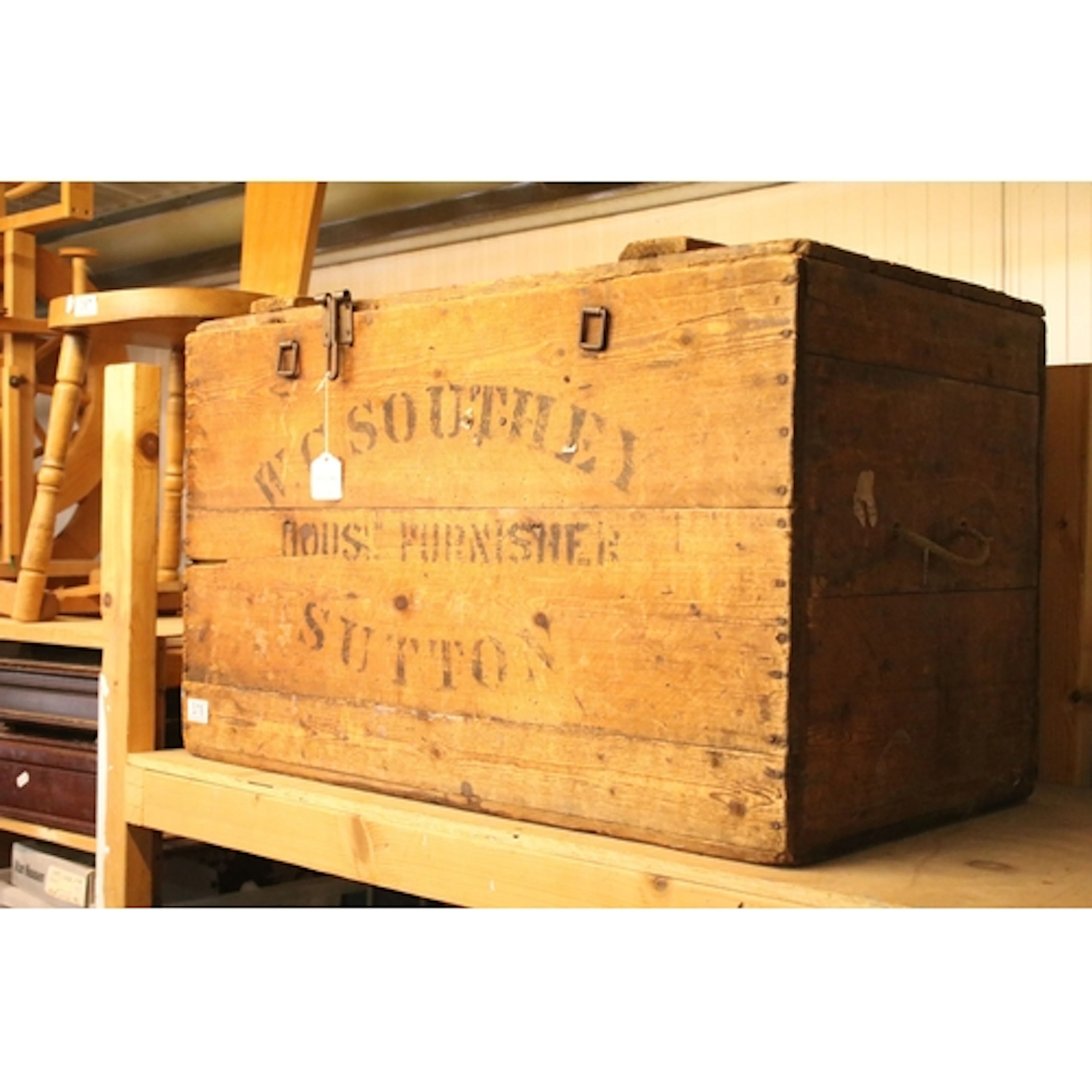 Large advertising pine trunk, stencilled with 'W. C. Southey...