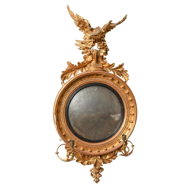 A George IV giltwood girandole, the convex plate in reeded c...